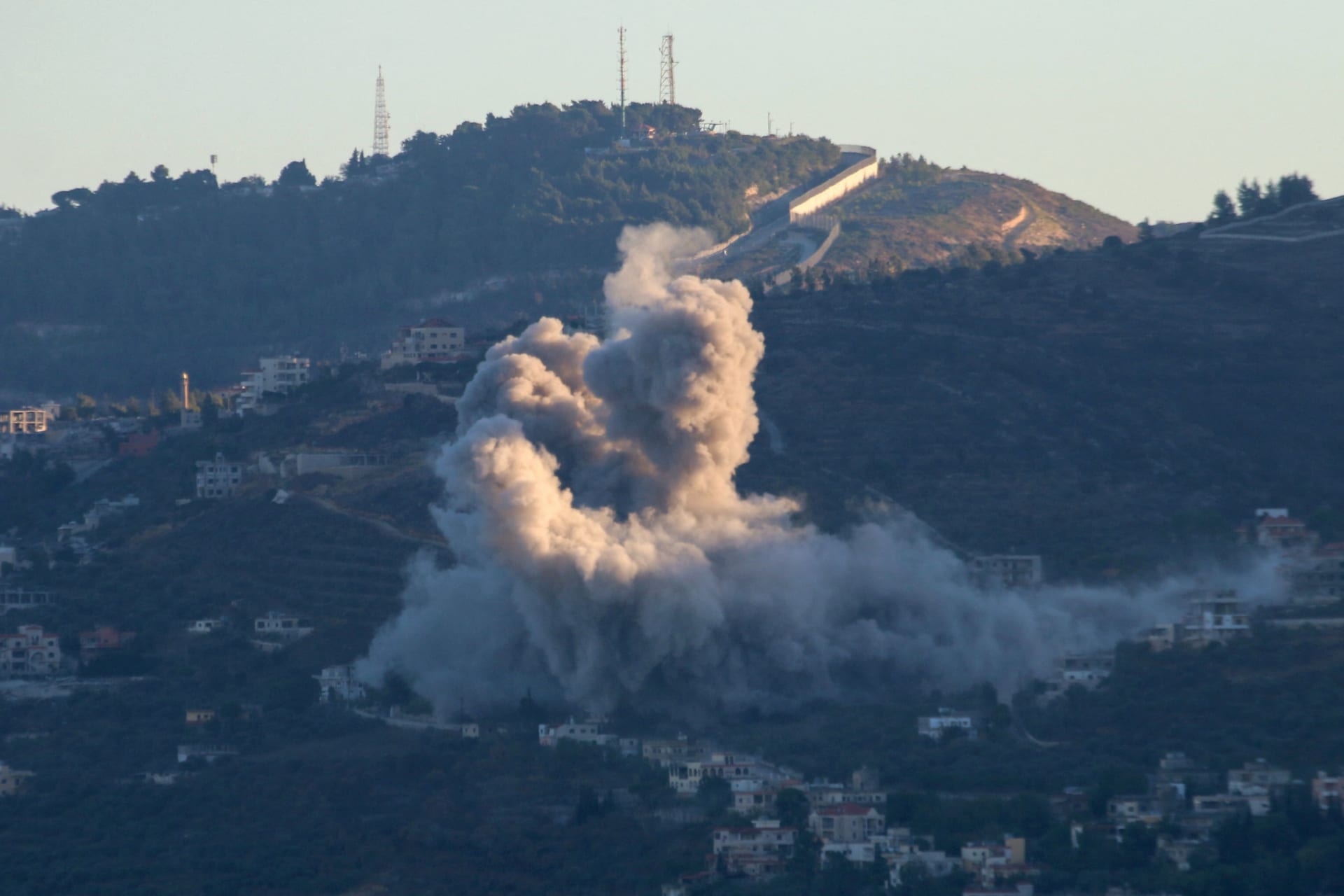 <p>Smoke rises from the southern Lebanese village of Kfar Kila, amid ongoing cross-border hostilities between Hezbollah and Israeli forces, as pictured from Marjayoun, near the border with Israel, on September 18, 2024</p>
