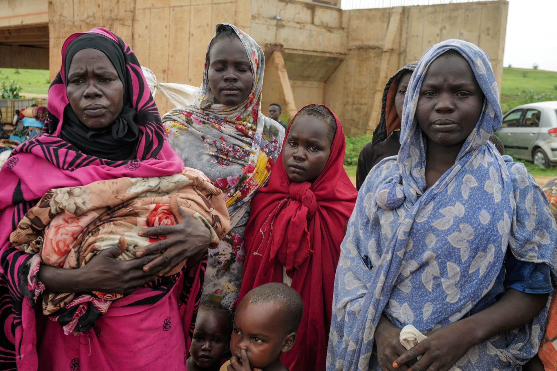 <p>Sudanese women, who fled the conflict in Murnei in Sudan’s Darfur region, look on while crossing the border between Sudan and Chad in Adre, Chad August 4, 2023. </p>

