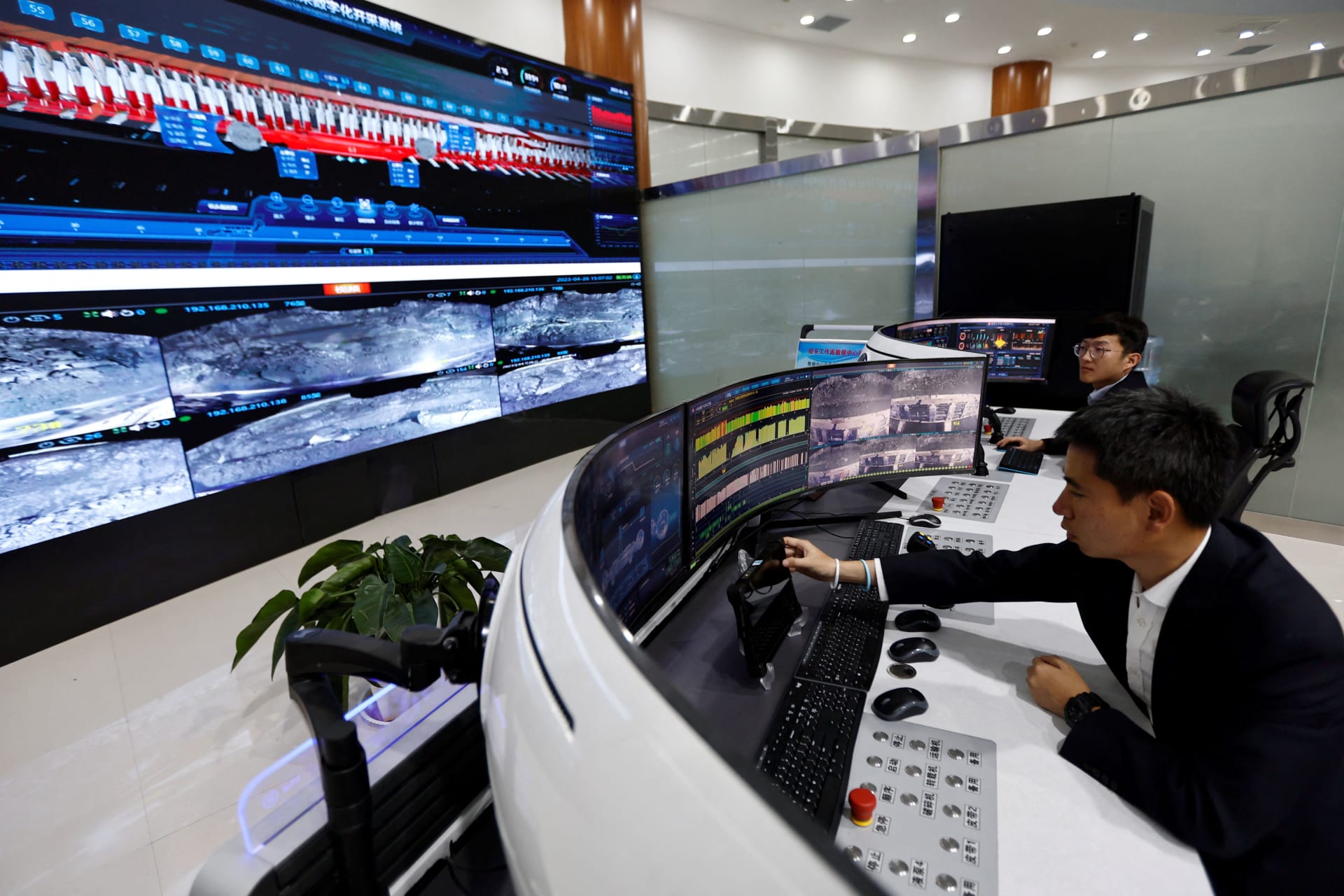 <p>Employees monitor screens showing real-time footages of mining operations in a ground control centre, at Xiaobaodang Coal Mine, during a Huawei-organised media tour, in Shenmu of Yulin city, Shaanxi province, China April 26, 2023.</p>
