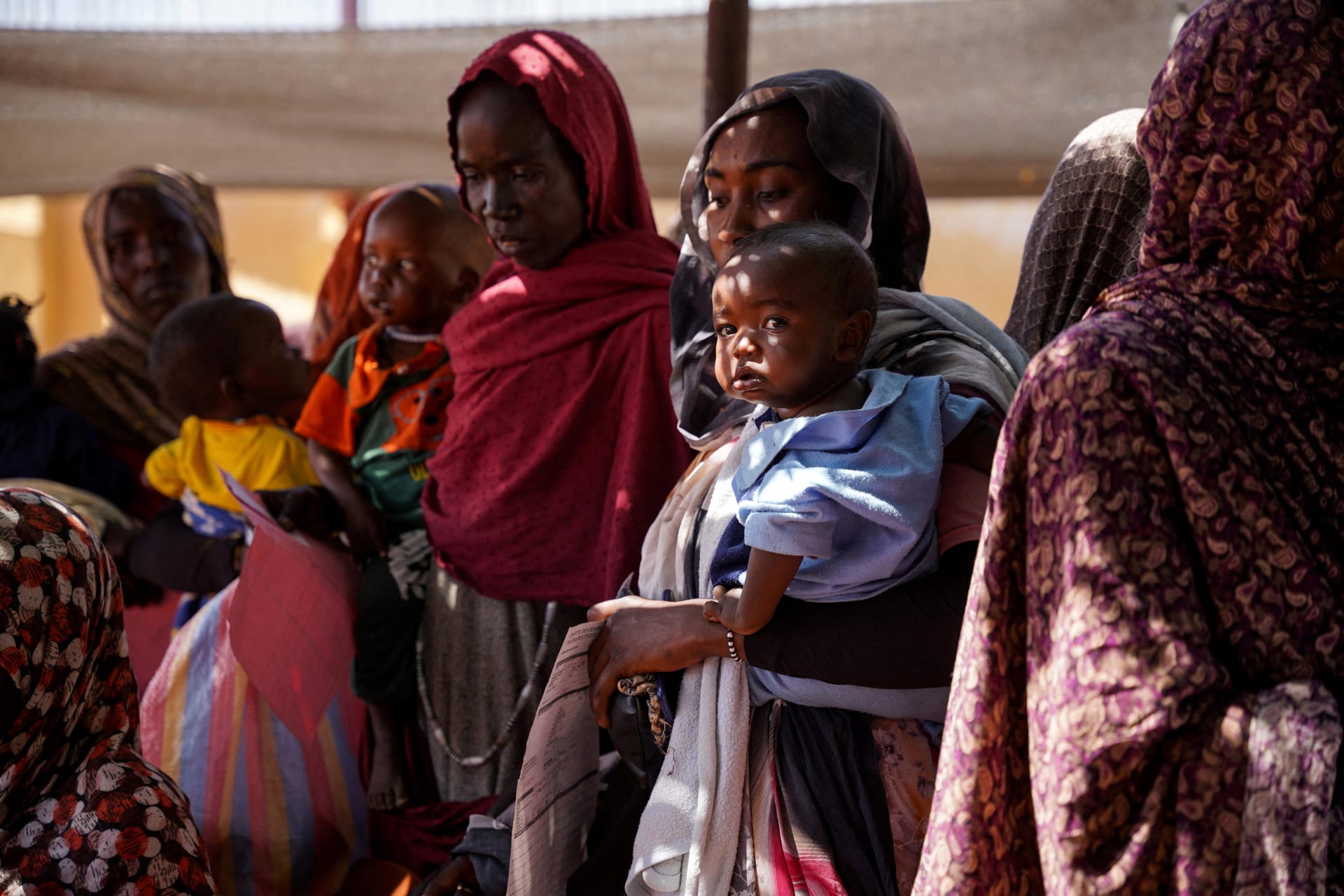 <p>A handout photograph, shot in January 2024, shows women and babies at the Zamzam displacement camp, close to El Fasher in North Darfur, Sudan.</p>
