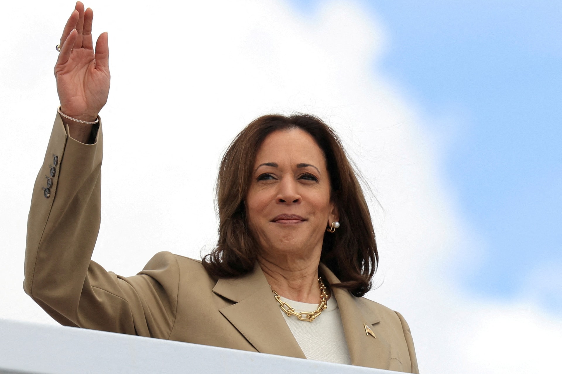 <p>Vice President Kamala Harris waves as she boards Air Force Two at Joint Base Andrews in Maryland on July 13, 2024.</p>
