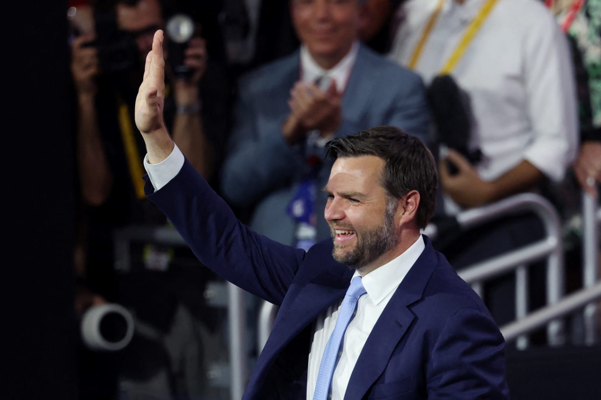 <p>Republican vice-presidential nominee JD Vance waves to the crowd on the first day of the Republican National Convention at the Fiserv Forum in Milwaukee, Wisconsin, on July 15, 2024. </p>
