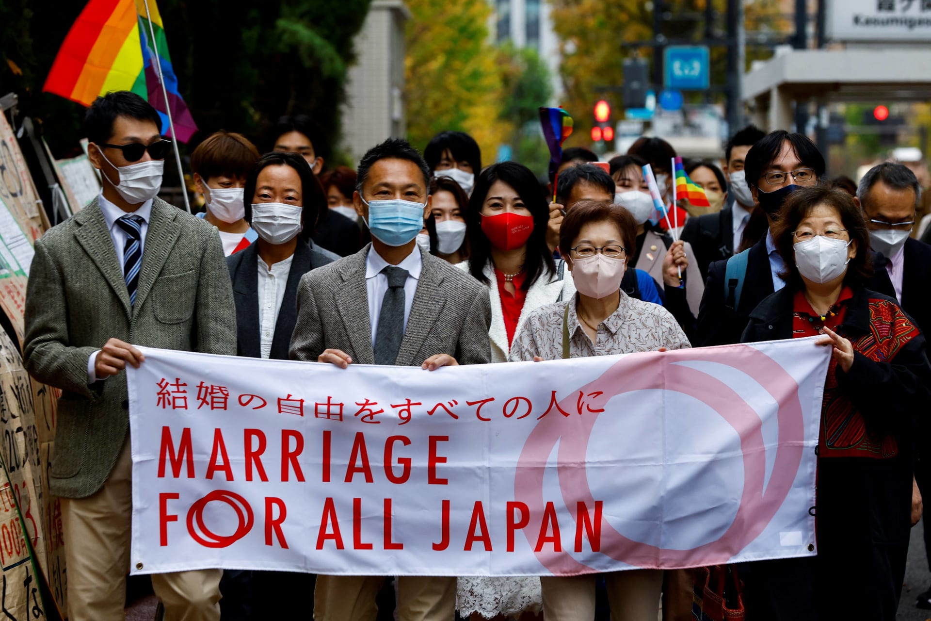 <p>Plaintiffs, lawyers and supporters march as they head to the court which will rule on the constitutionality of same-sex marriage, in Tokyo, Japan, November 30, 2022. </p>
