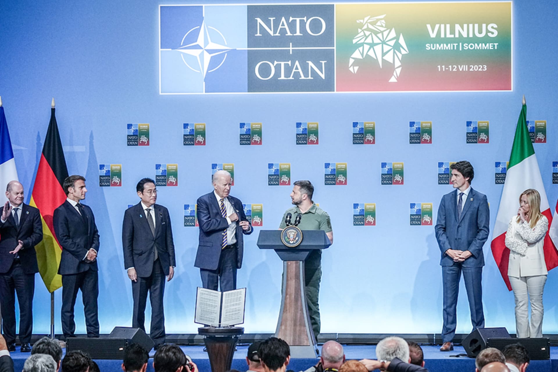 <p>NATO leaders stand next to Ukrainian President Volodymyr Zelenskyy as he speaks on the sidelines of the 2023 NATO summit in Vilnius, Lithuania.</p>
