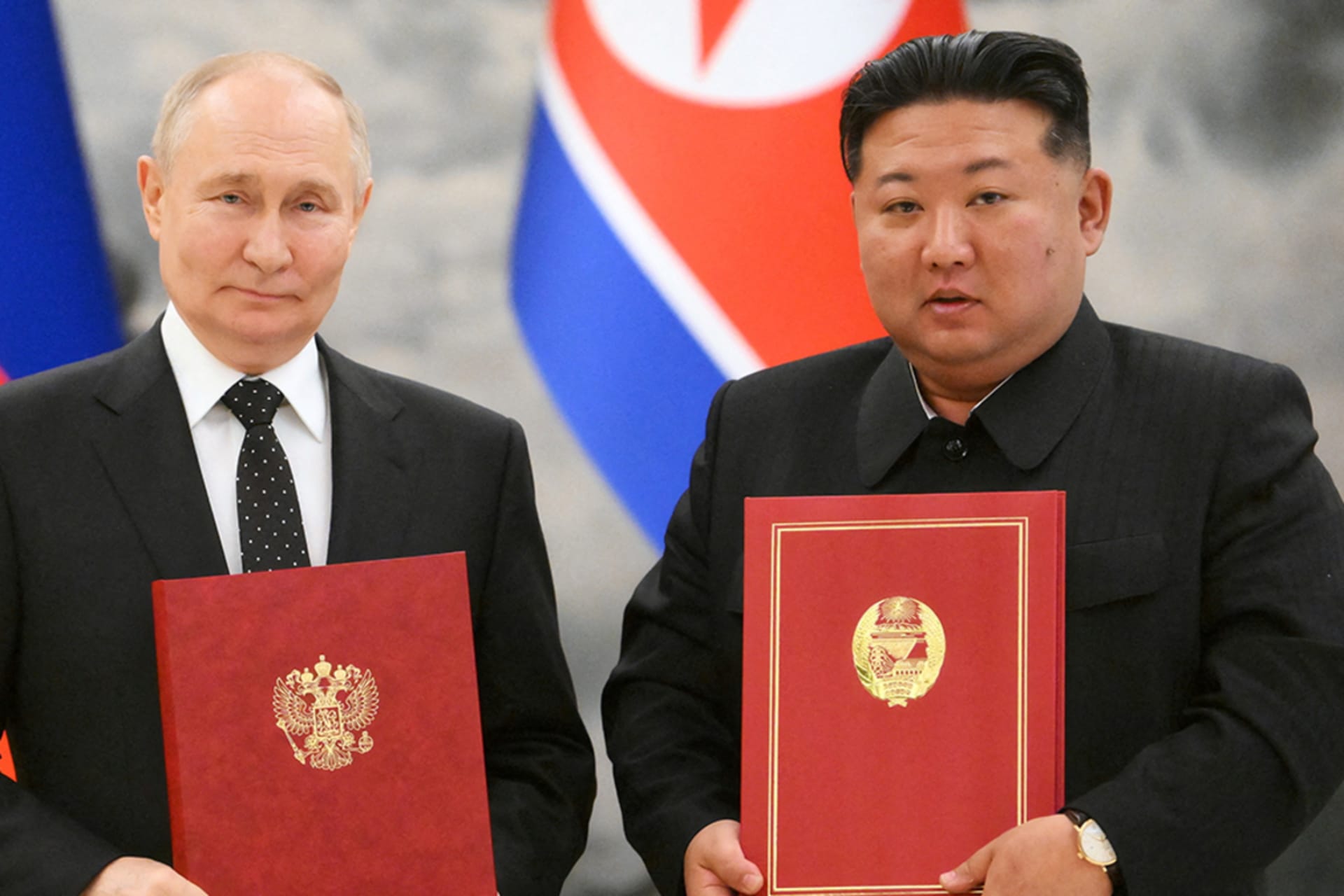 <p>Russia’s President Vladimir Putin and North Korea’s leader Kim Jong Un pose for a photo during a signing ceremony in Pyongyang, North Korea.</p>
