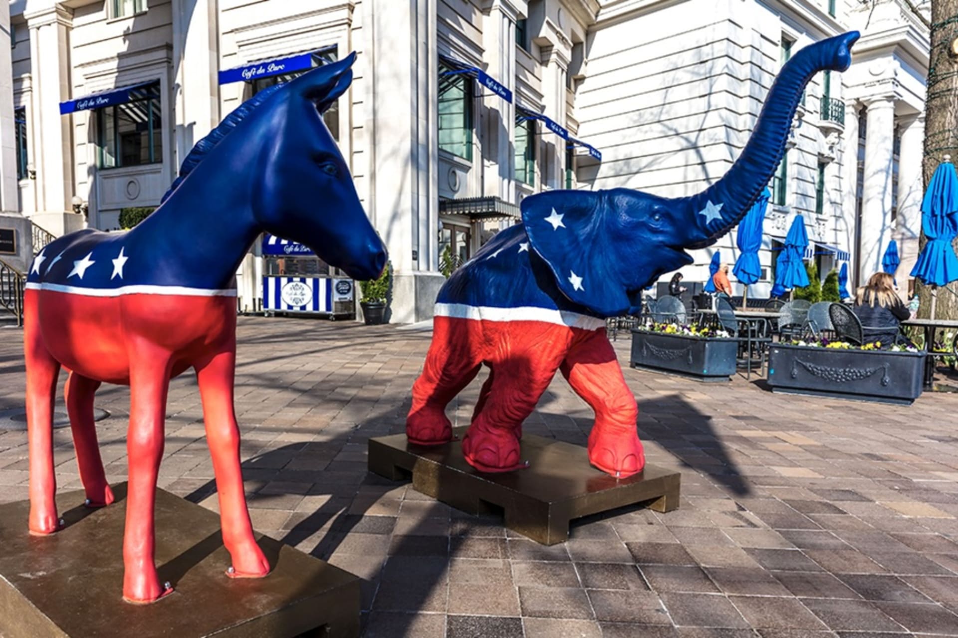 <p>Democratic mule and Republican elephant statues stand in front of the Willard Hotel in Washington, DC.</p>
