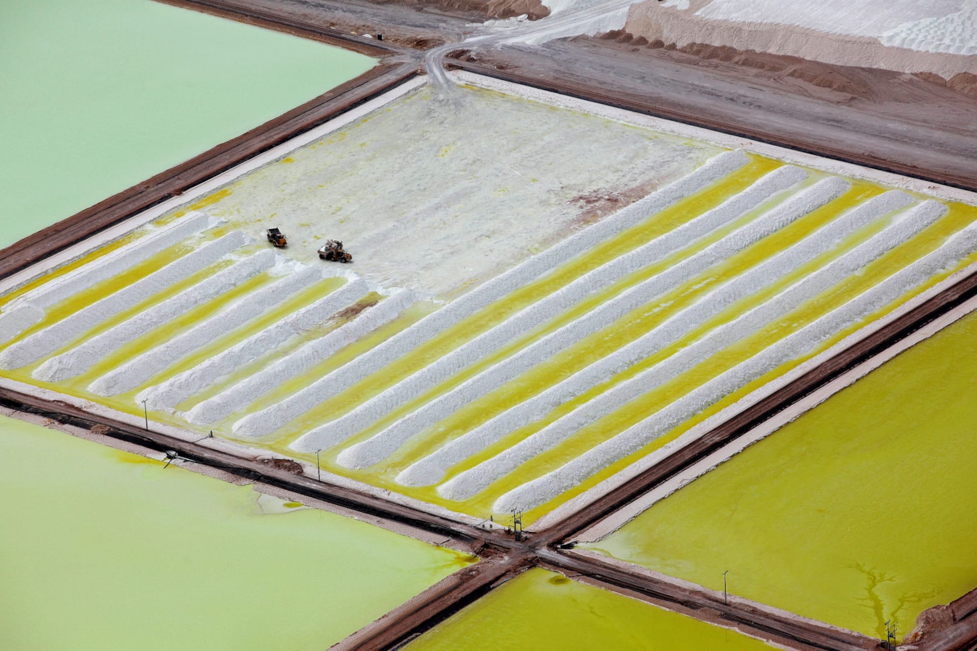 <p>An aerial view of the brine pools and processing areas of the Soquimich lithium mine on the Atacama salt flat, the largest lithium deposit currently in production, in the Atacama desert of northern Chile.</p>
