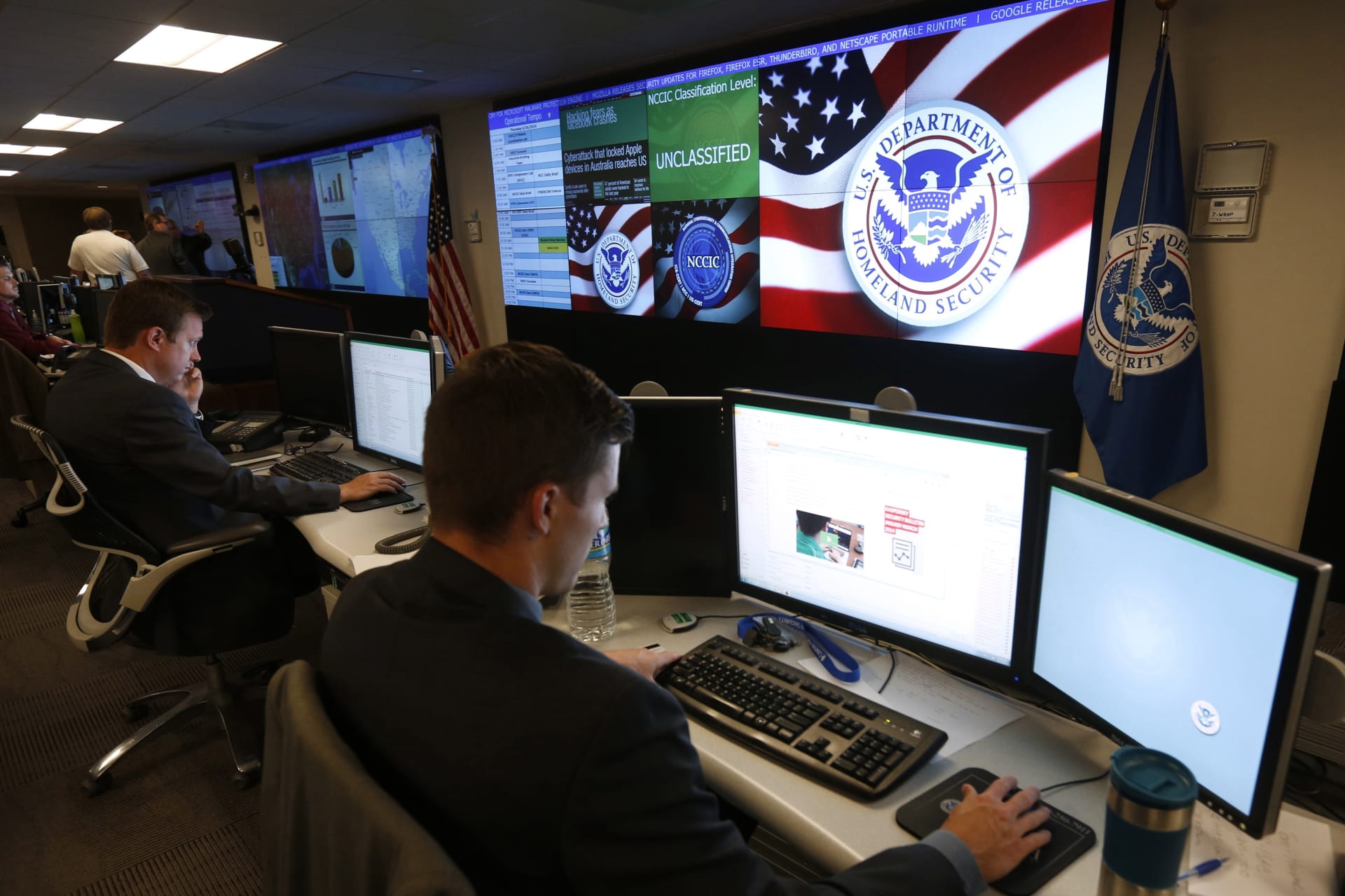 <p>U.S. Department of Homeland Security employees work inside the National Cybersecurity and Communications Integration Center in Arlington, VA.</p>
