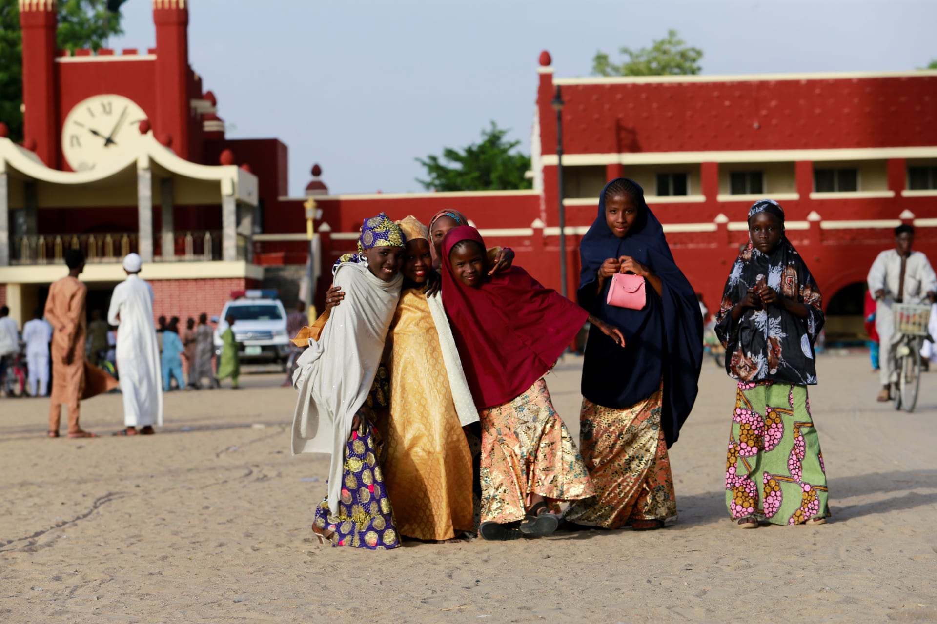 <p>A group of girls stand near the Shehu of Borno’s palace on the eve of the Eid- Al Fitr festival in Maiduguri, Nigeria </p>
