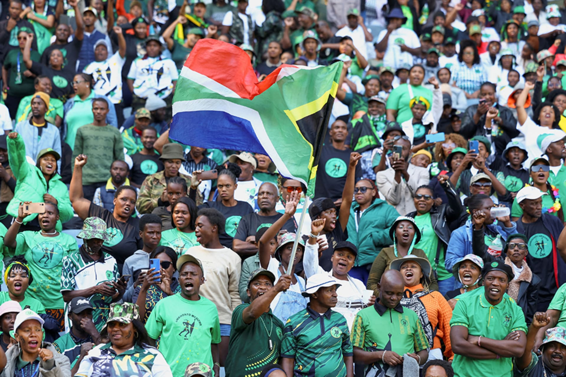<p>Supporters of former South African President Jacob Zuma’s new political party wave the South African flag ahead of a general election in 2024.</p>
