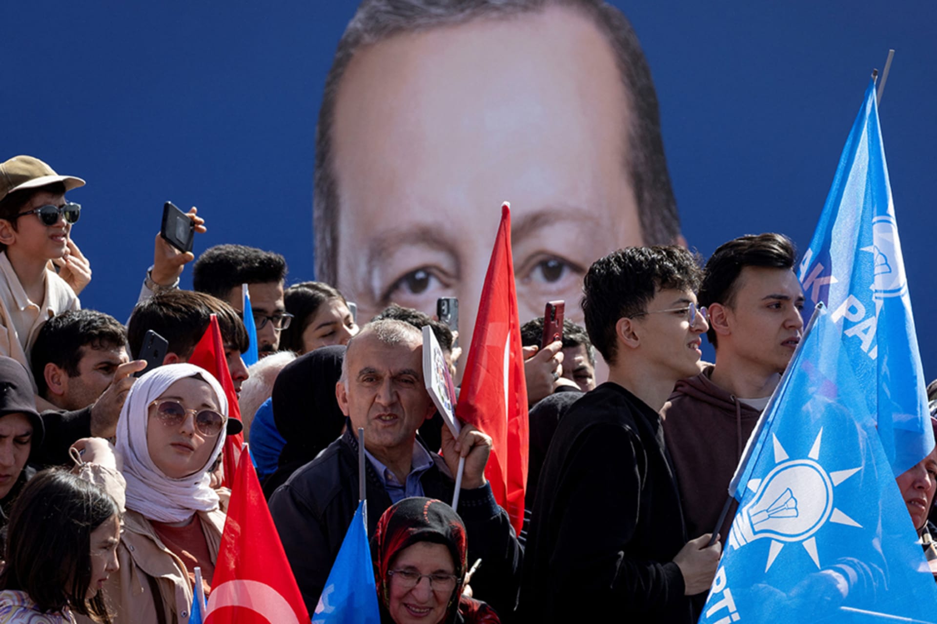 <p>Supporters of Turkish President Recep Tayyip Erdogan listen to his speech during a rally ahead of local elections in Istanbul, Turkey, in March 2024.</p>
