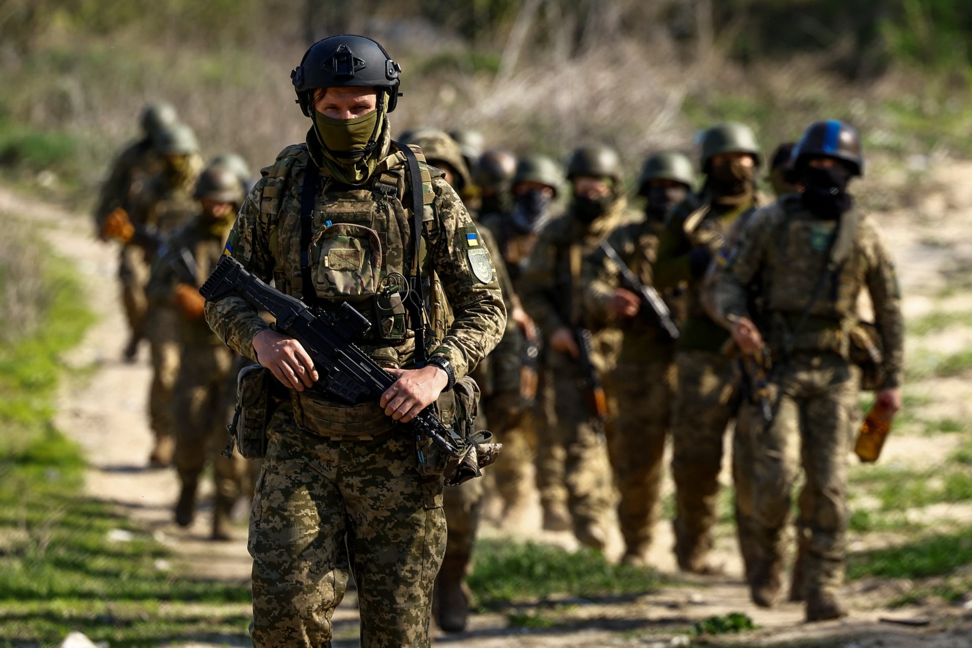 <p>Members of the Siberian Battalion of the Ukrainian Armed Forces’ International Legion arrive for military exercises in the Kyiv region of Ukraine.</p>