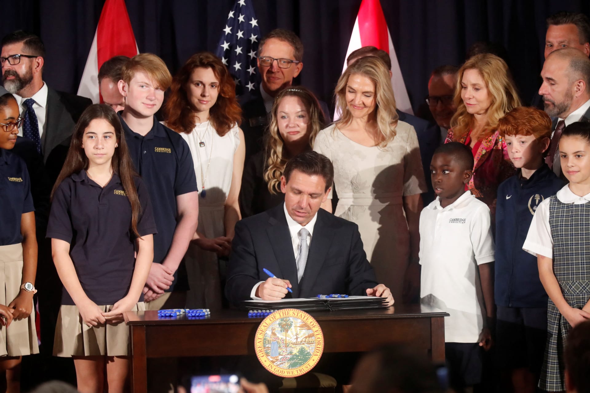 <p>Florida Governor Ron DeSantis signs five state house bills into law after giving a press conference at Cambridge Christian School in Tampa, Florida on May 17, 2023.</p>
