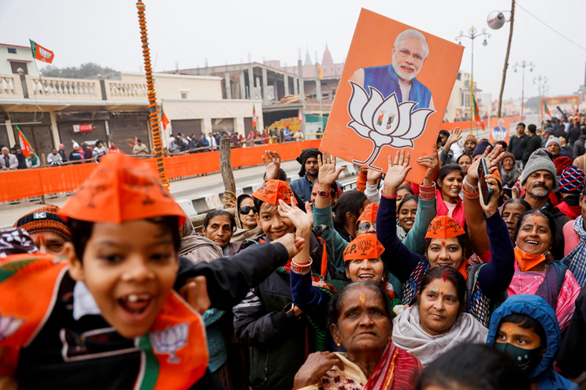 <p>Supporters of Bharatiya Janata Party (BJP) cheer after India’s Prime Minister Narendra Modi’s roadshow in Ayodhya, Uttar Pradesh, India.</p>
