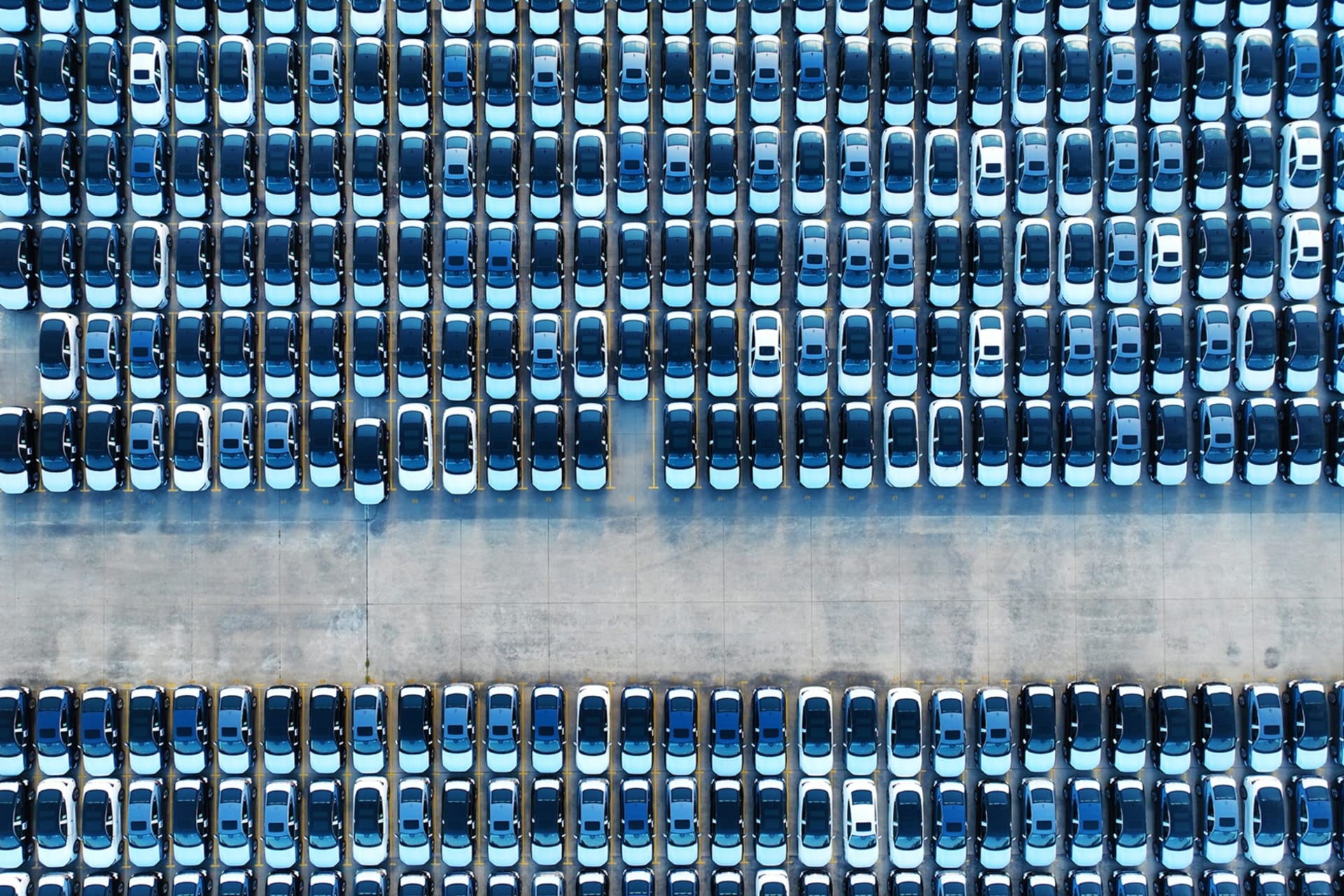 <p>Chery Automobile Co. vehicles wait for shipment at a port in Wuhu, Anhui Province of China.</p>
