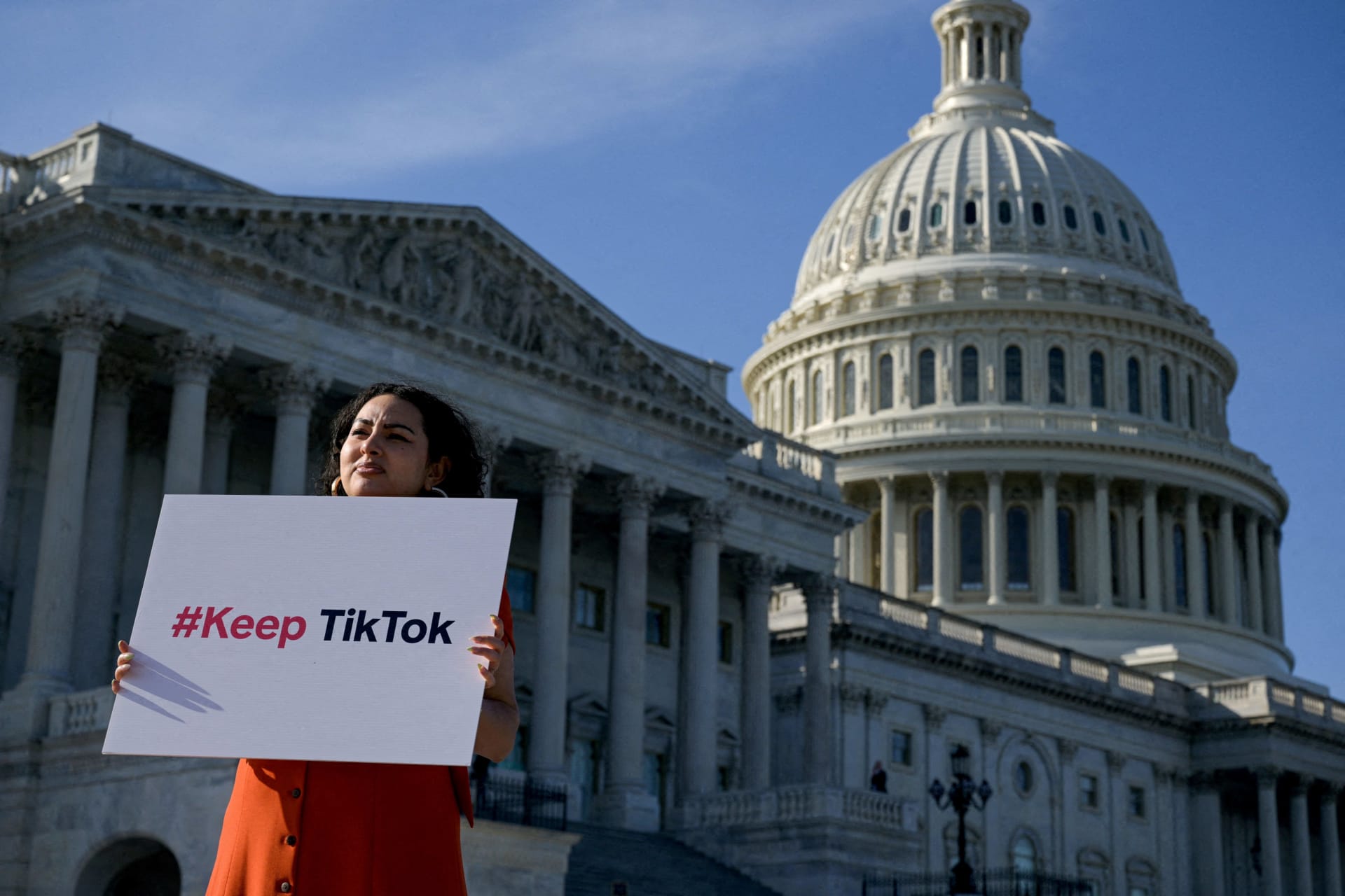 <p>Giovanna Gonzalez of Chicago demonstrates outside the U.S. Capitol following a press conference by TikTok creators to voice their opposition to a bill that would ban the app on Capitol Hill in Washington, D.C.</p>
