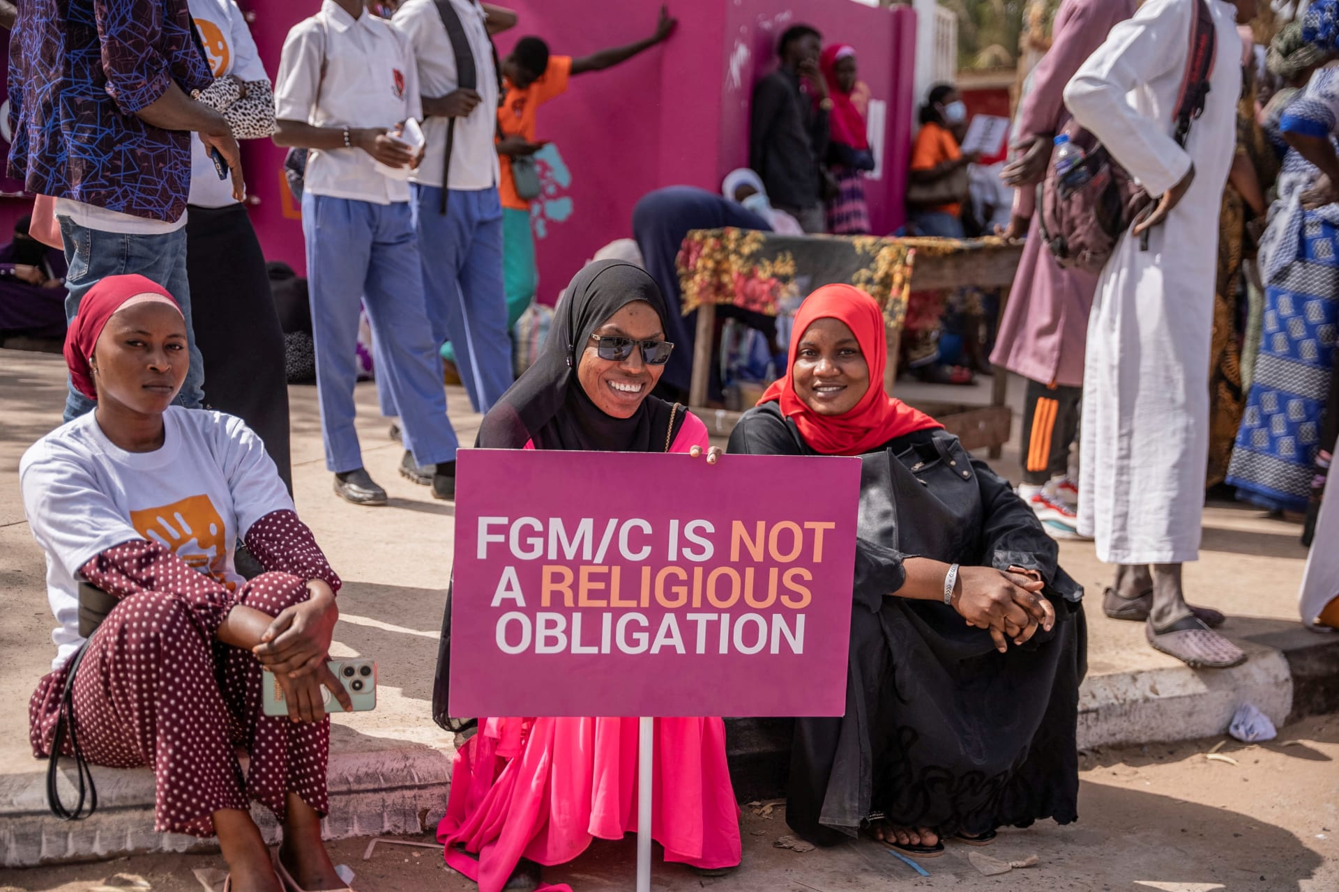 <p>Gambians protest against a bill aimed at decriminalizing female genital mutilation as parliament debates the bill in Banjul, Gambia March, 18, 2024.</p>
