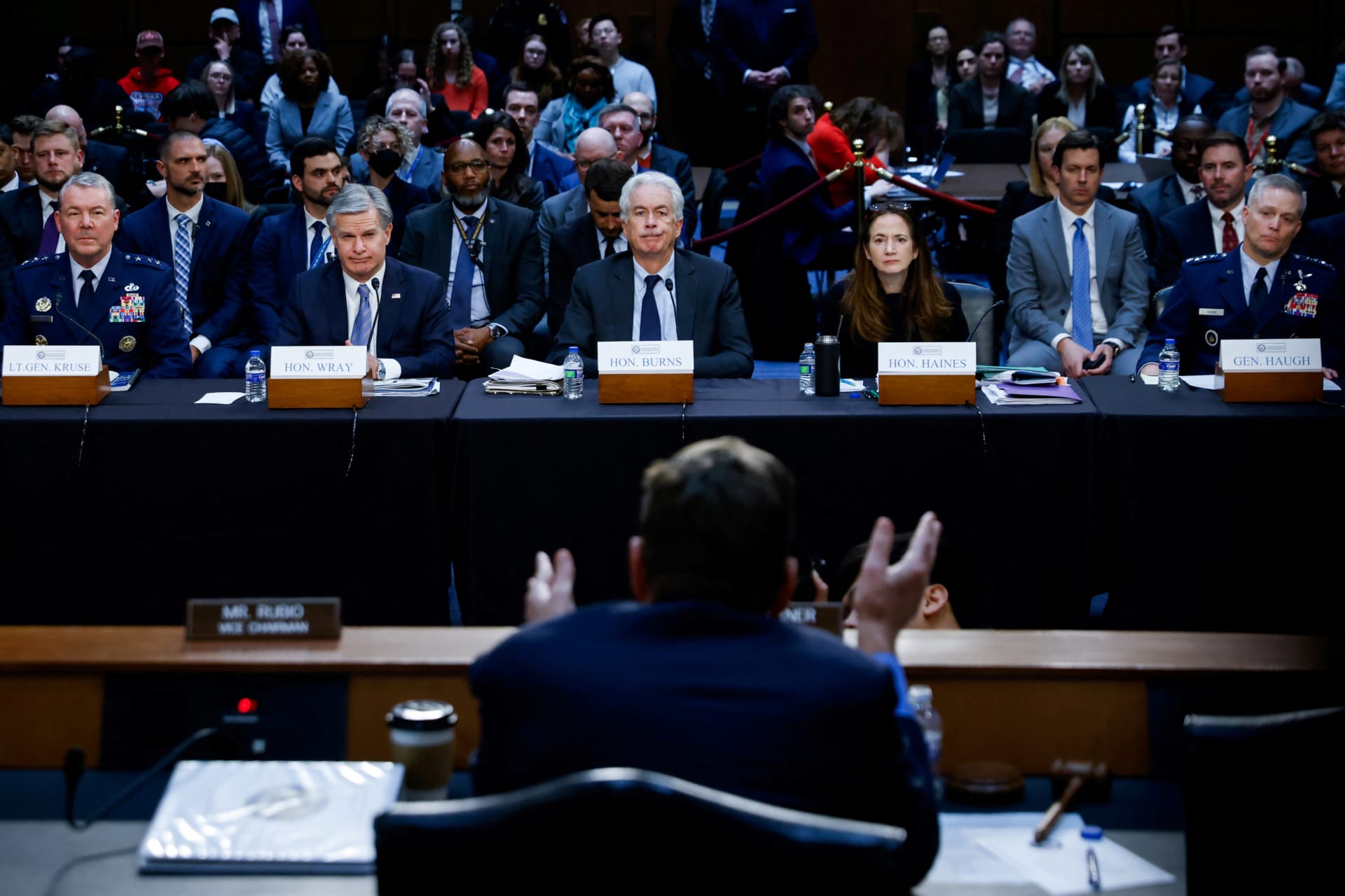 <p>U.S. intelligence officials look on as Senator Mark Warner (D-VA) speaks at a Senate Intelligence Committee hearing on worldwide threats to American security, on Capitol Hill in Washington, D.C. on March 11, 2024.</p>
