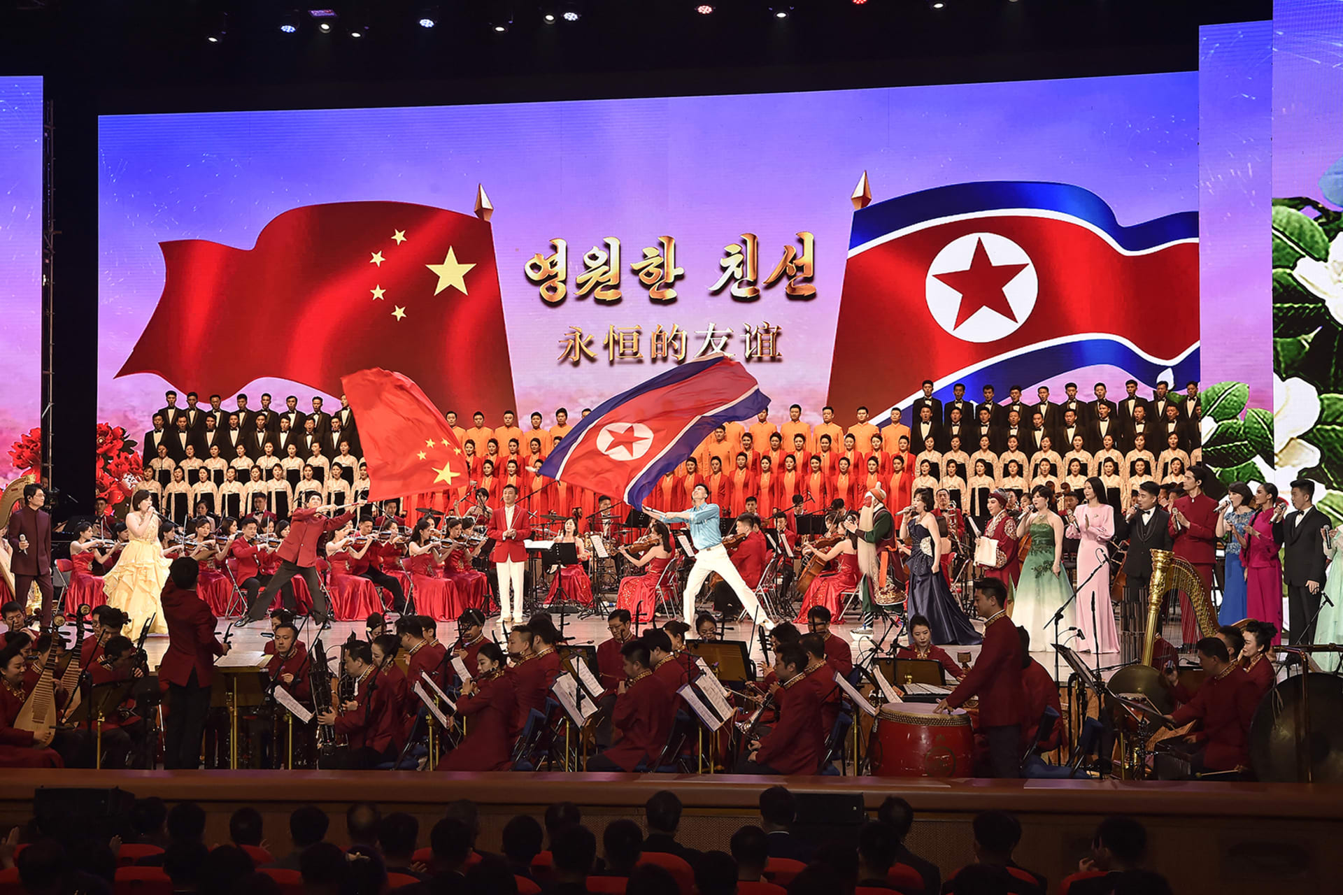 <p>Artists perform in the “North Korea-China Friendship Year” ceremony at a theater in Pyongyang.</p>
