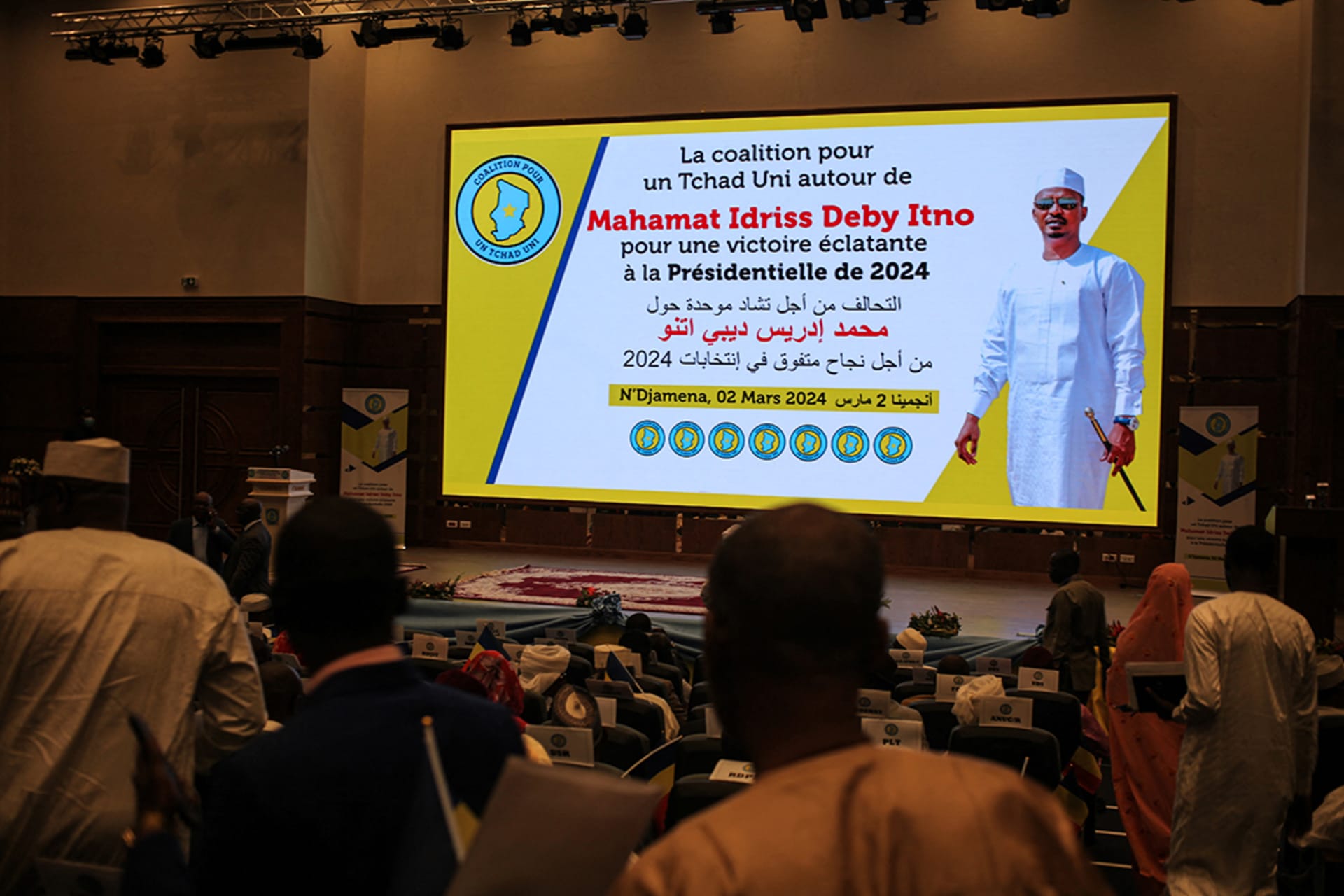 <p>Delegates wait for Chad’s transitional president General Mahamat Idriss Déby Itno to arrive ahead of an inauguration meeting of a coalition of parties for his candidacy for the presidential election set for May, in N’Djamena, Chad on March 2, 2024. </p>
