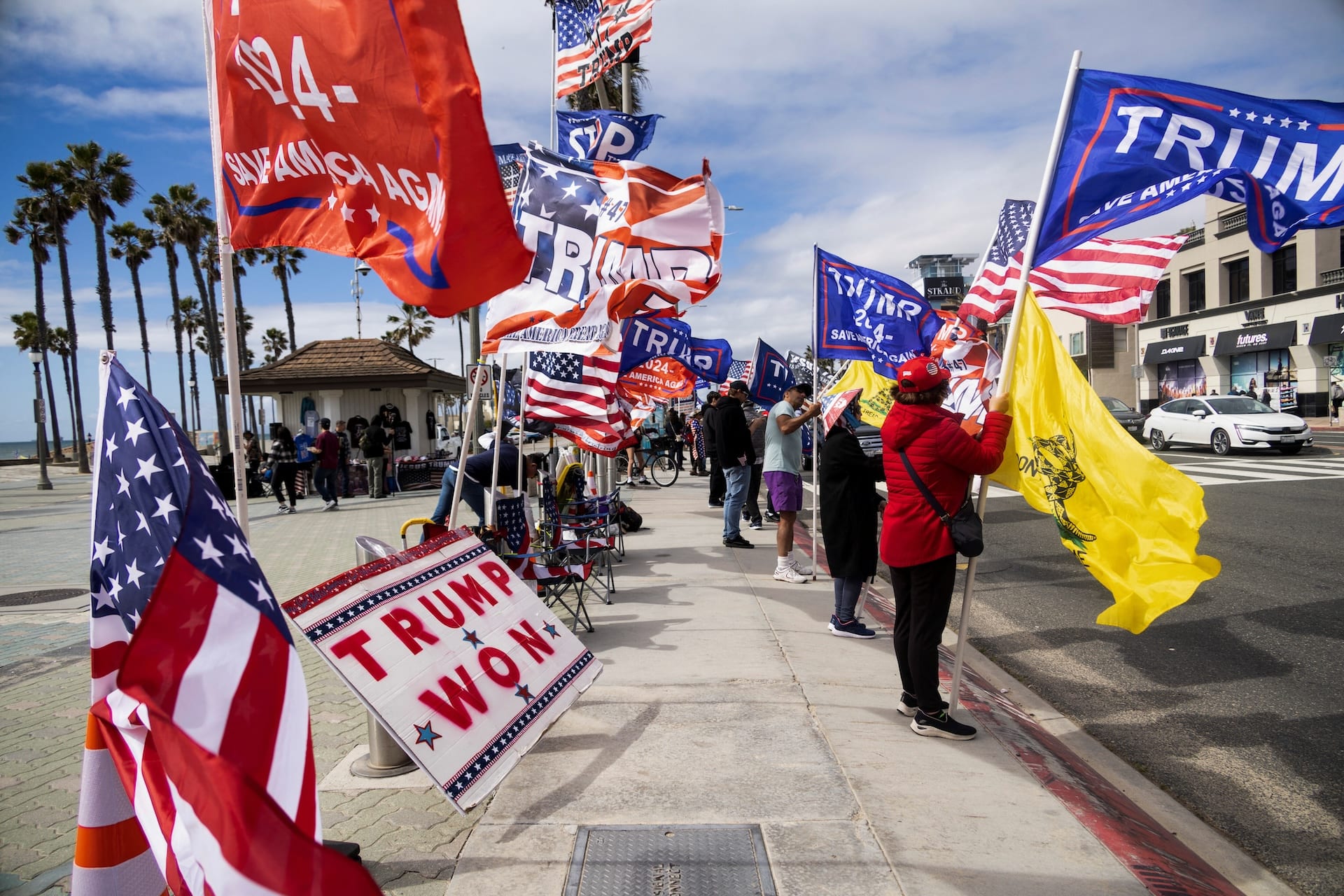 <p>Supporters of Republican presidential candidate and former U.S. President Donald Trump gather, ahead of Super Tuesday, in Huntington Beach, California, U.S.</p>
