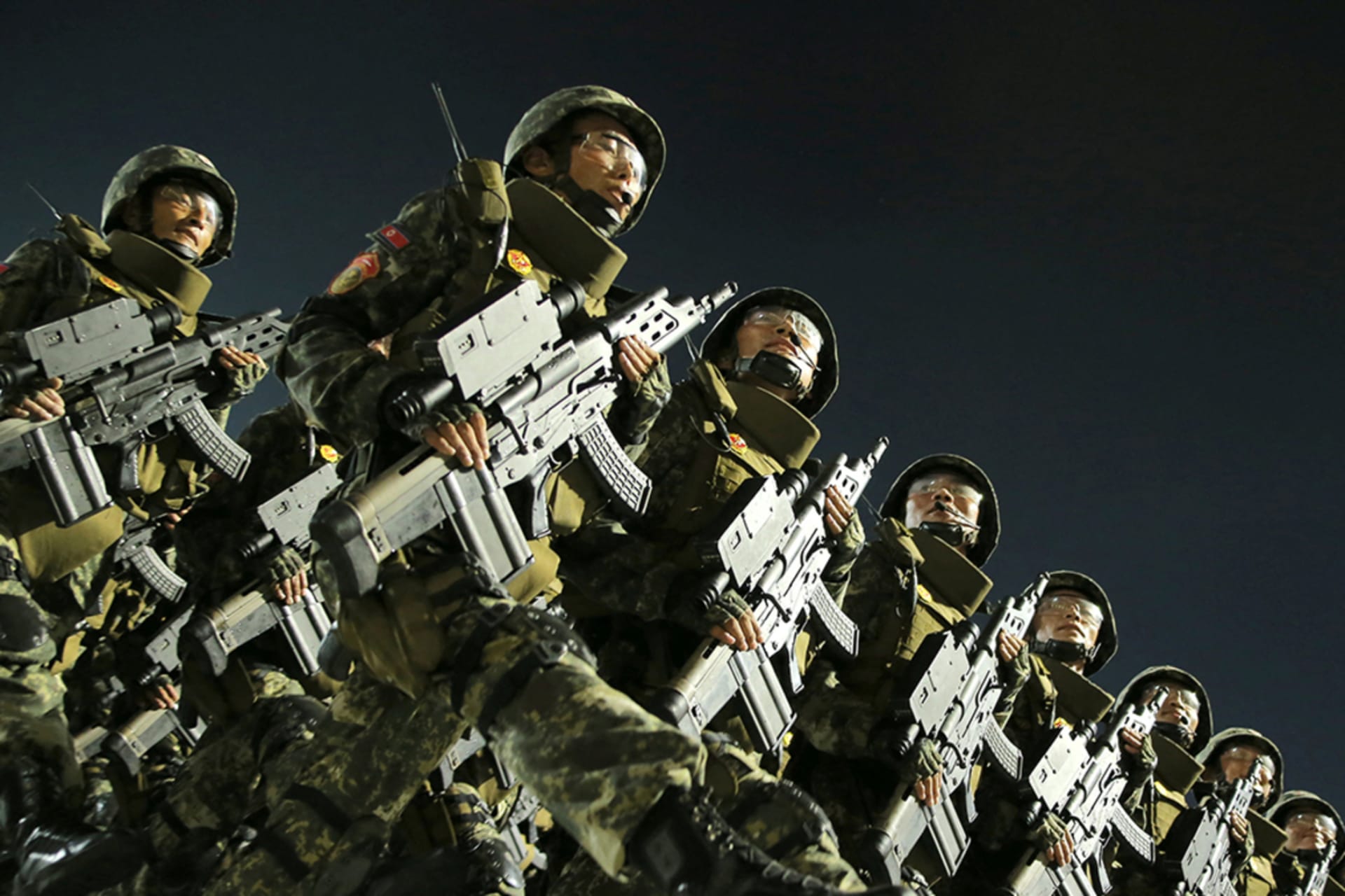 <p>Soldiers march in a military parade in Pyongyang, North Korea to commemorate the 70th anniversary of the Korean War armistice.</p>
