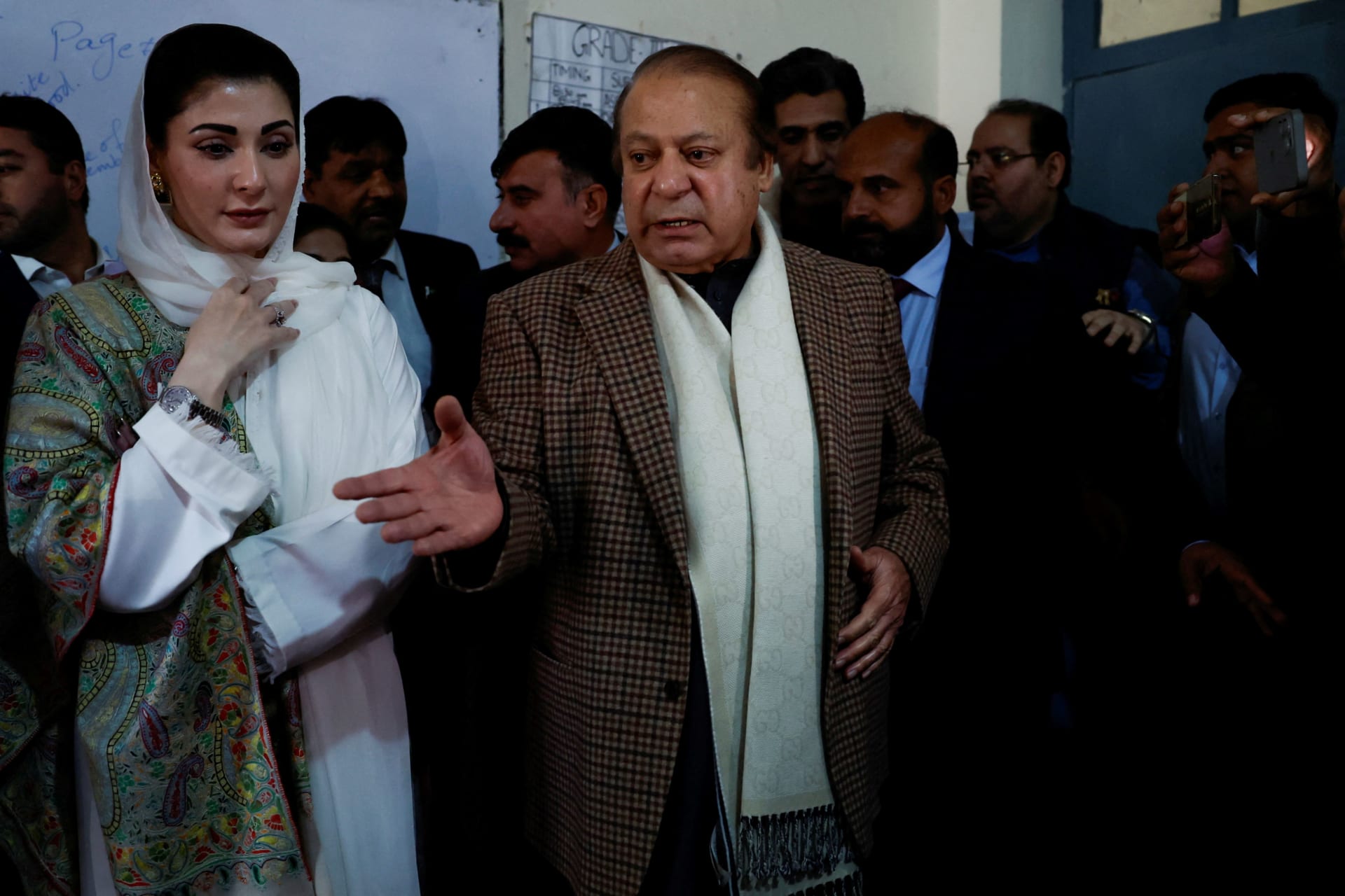 <p>Former Prime Minister Nawaz Sharif speaks to members of the media as he arrives to cast his vote at a polling station during the general election in Lahore, Pakistan, on February 8, 2024.</p>

