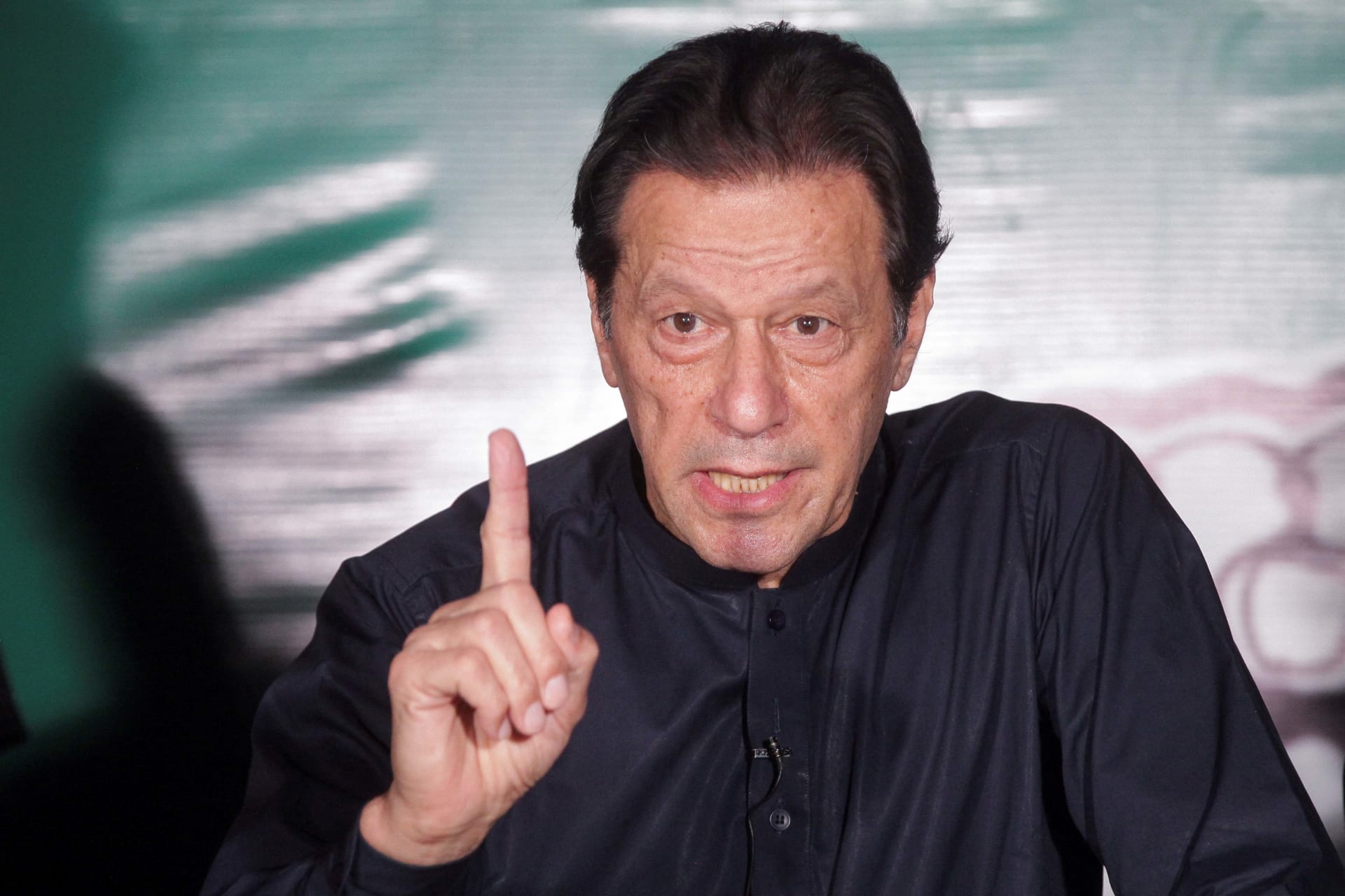 <p>Pakistan’s former Prime Minister Imran Khan, gestures as he speaks to the members of the media at his residence in Lahore, Pakistan, on May 18, 2023.</p>
