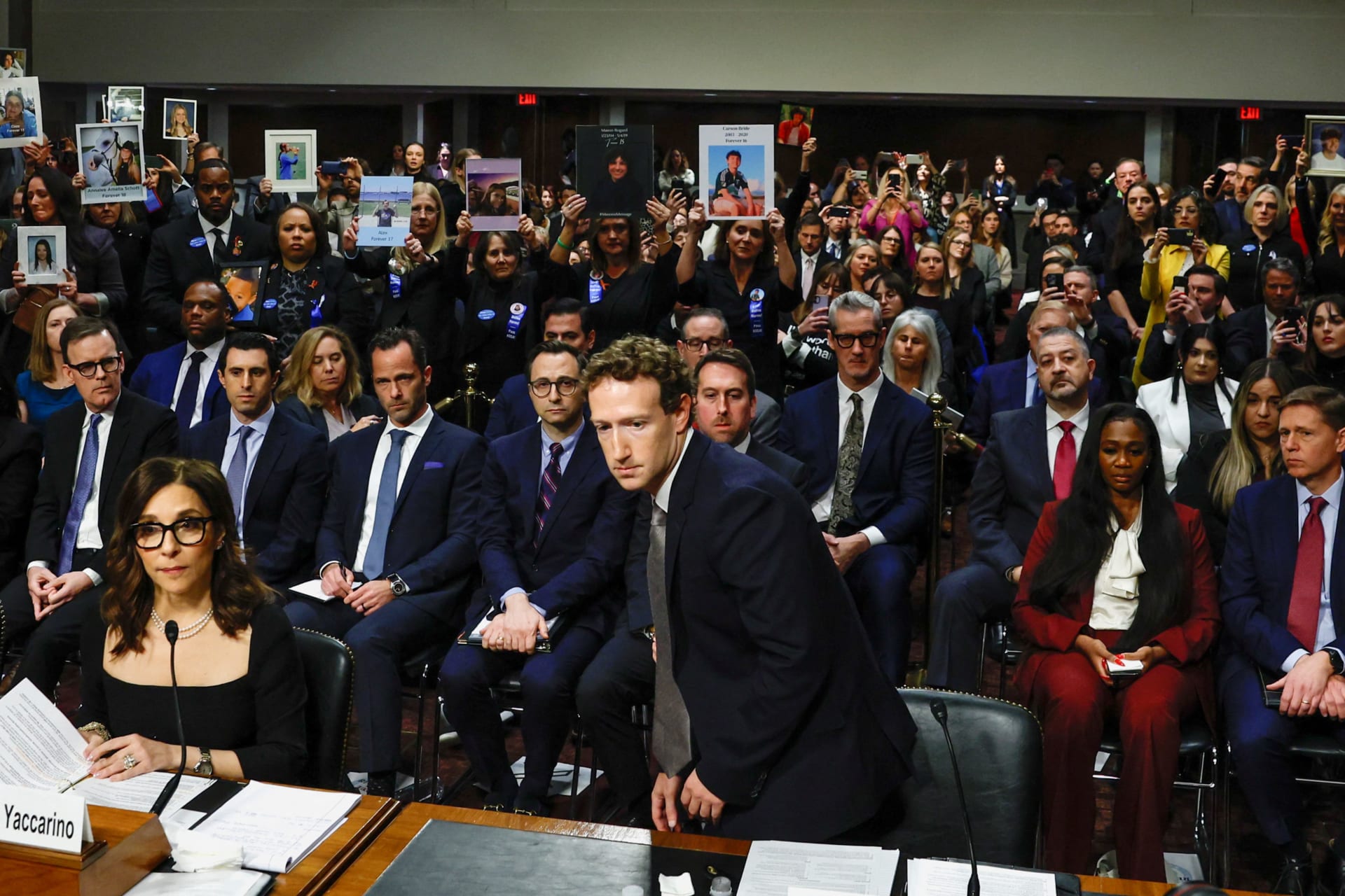 <p>Meta’s CEO Mark Zuckerberg returns to his seat after standing and facing the audience while he testified during the Senate Judiciary Committee hearing on online child sexual exploitation at the U.S. Capitol in Washington, D.C. on January 31, 2024</p>
