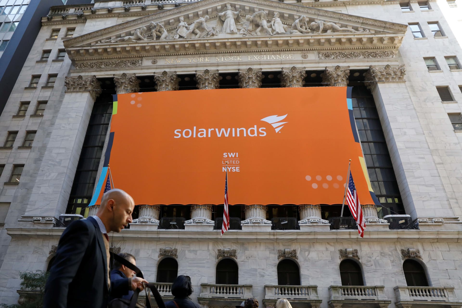 <p>SolarWinds banner hangs at the New York Stock Exchange (NYSE) on the day of the company’s initial public offering in New York on October 19, 2018.</p>
