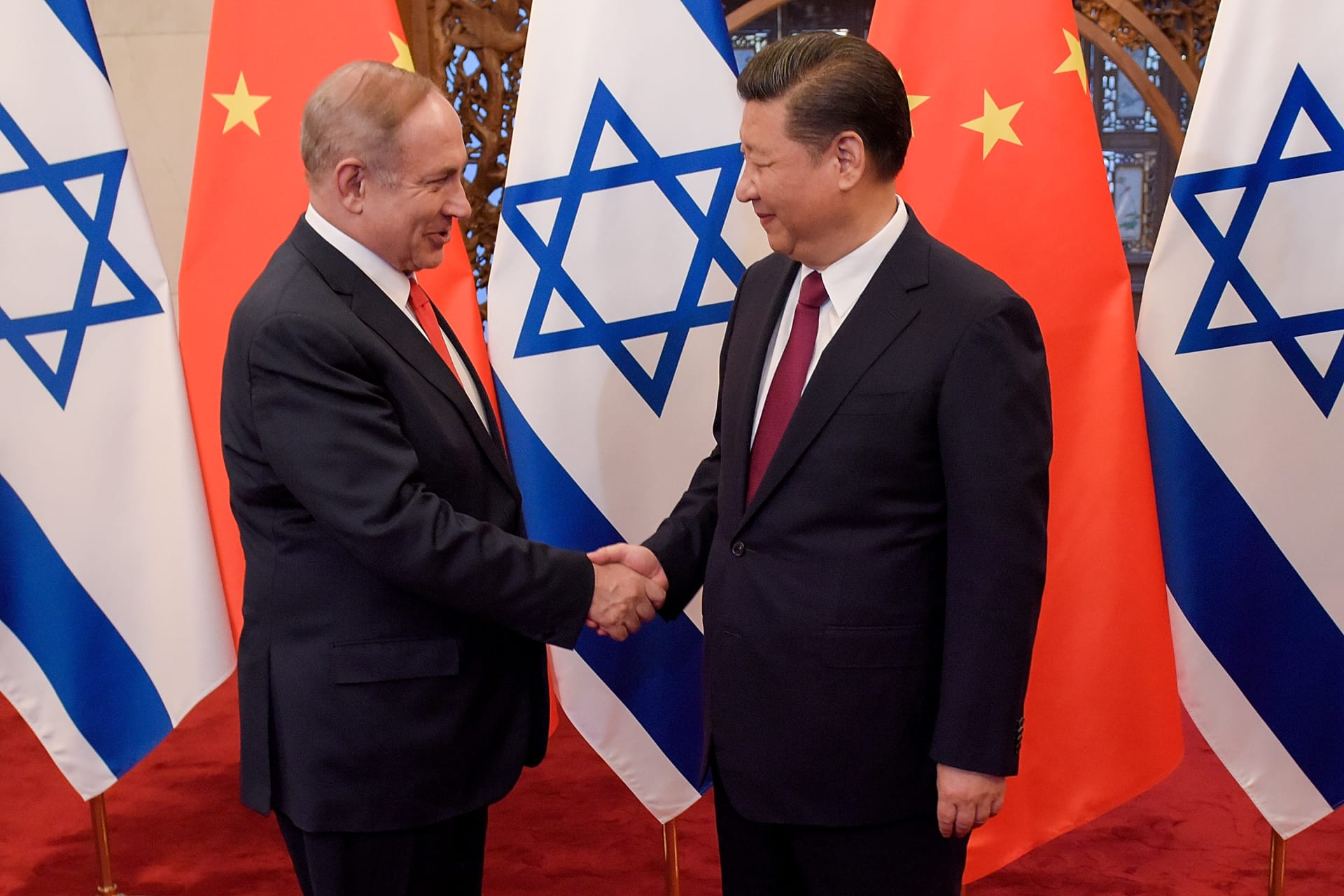 <p>Chinese President Xi Jinping and Israeli Prime Minister Benjamin Netanyahu shake hands ahead of their talks at Diaoyutai State Guesthouse in Beijing, China March 21, 2017.</p>
