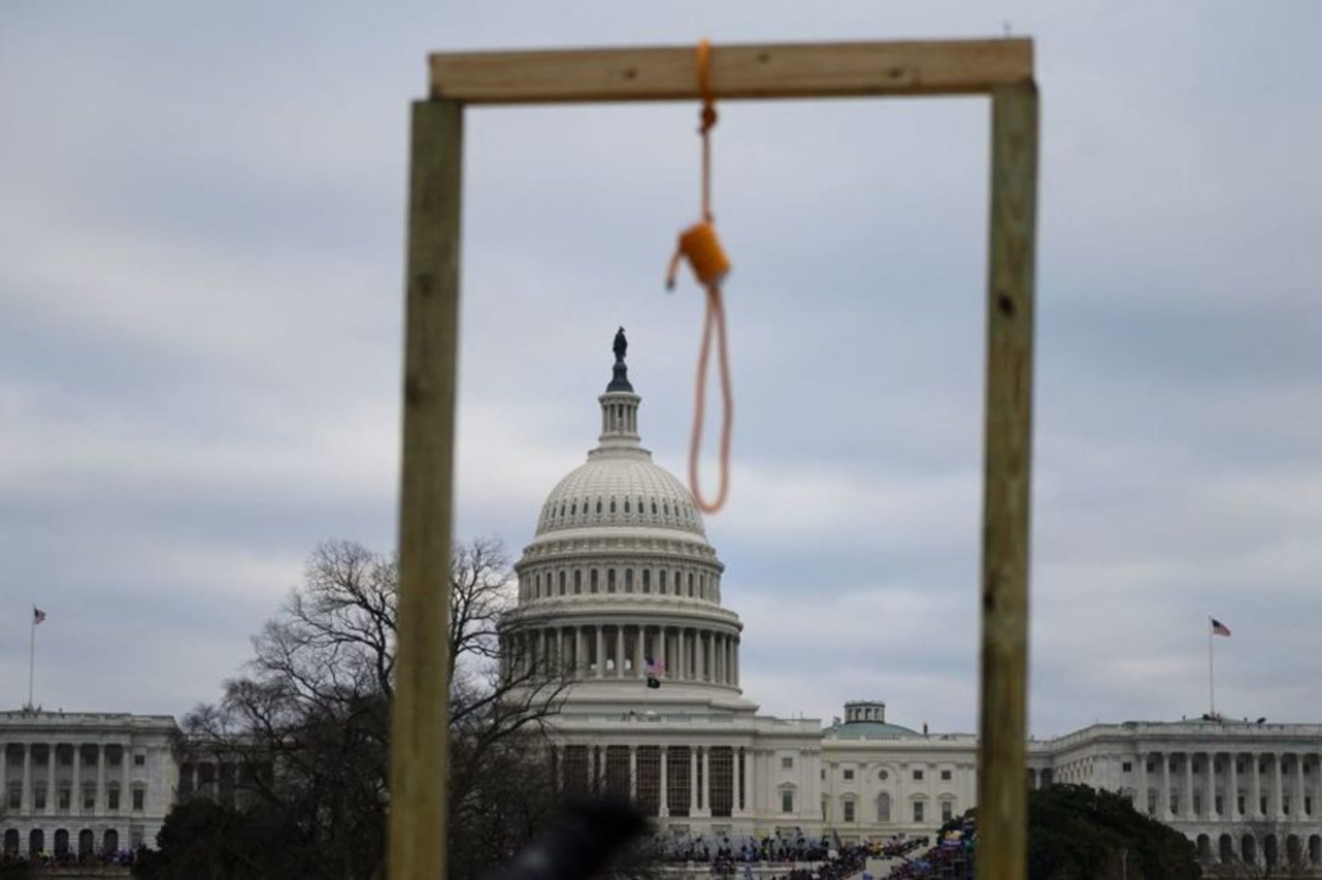 <p>A noose hangs from makeshift gallows at the US Capitol in Washington D.C. on January 6, 2021.</p>
