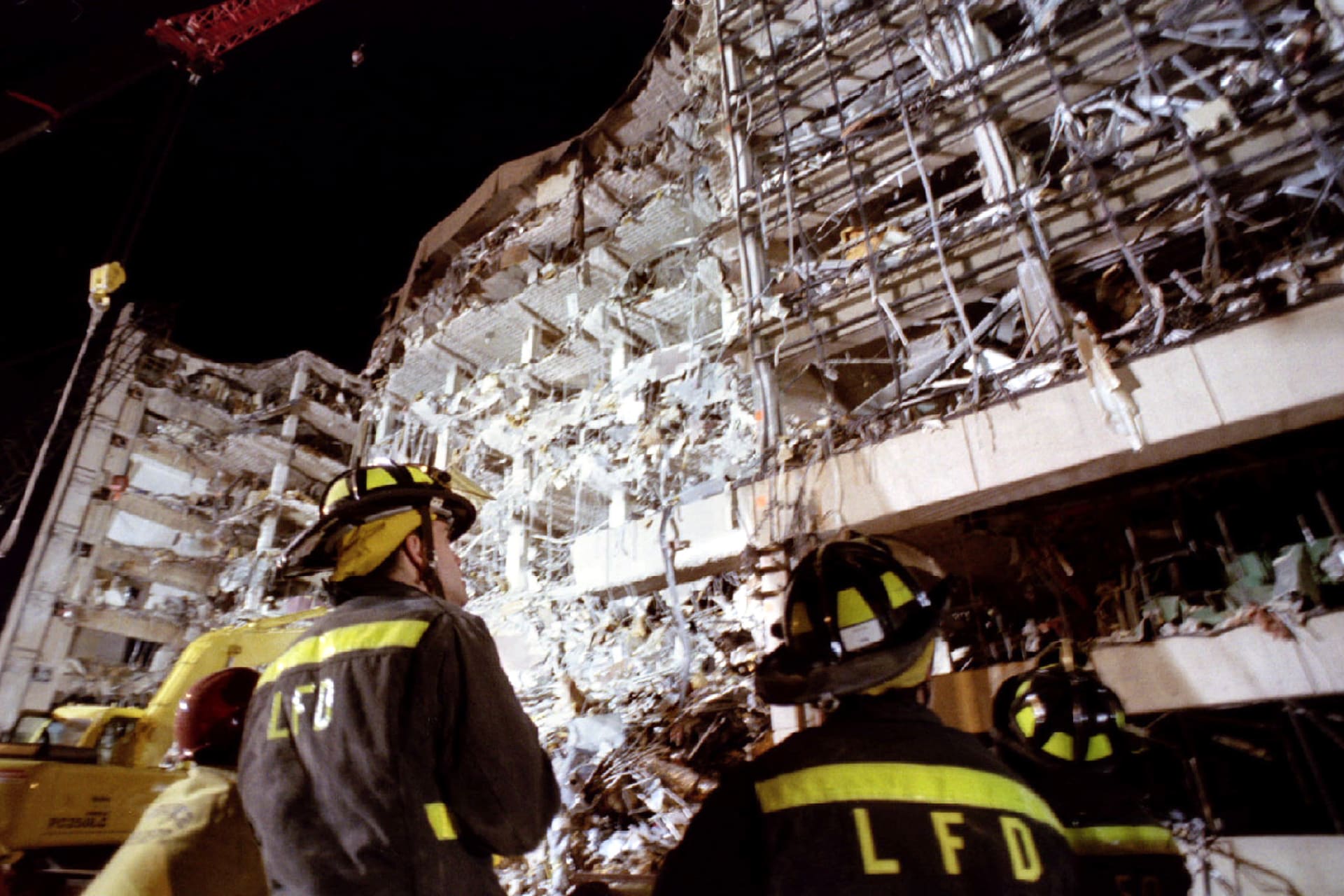 <p>Firefighters examine the wreckage of the Alfred P. Murrah Federal Building in the wake of the 1995 Oklahoma City bombing.</p>
