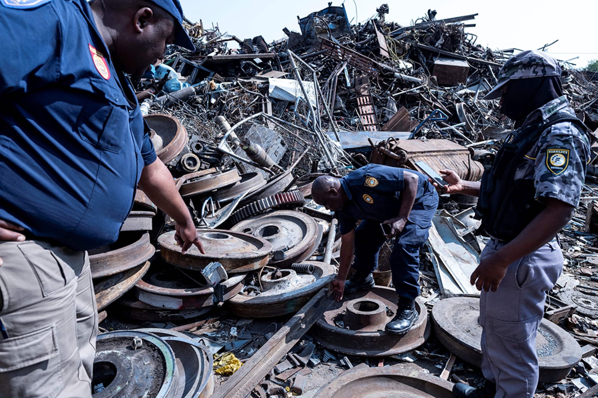 <p>Johannesburg Metro Police Department officers discover railway infrastructure in a scrapyard during a raid on a highjacked property in Johannesburg, South Africa on September 6, 2023. </p>
