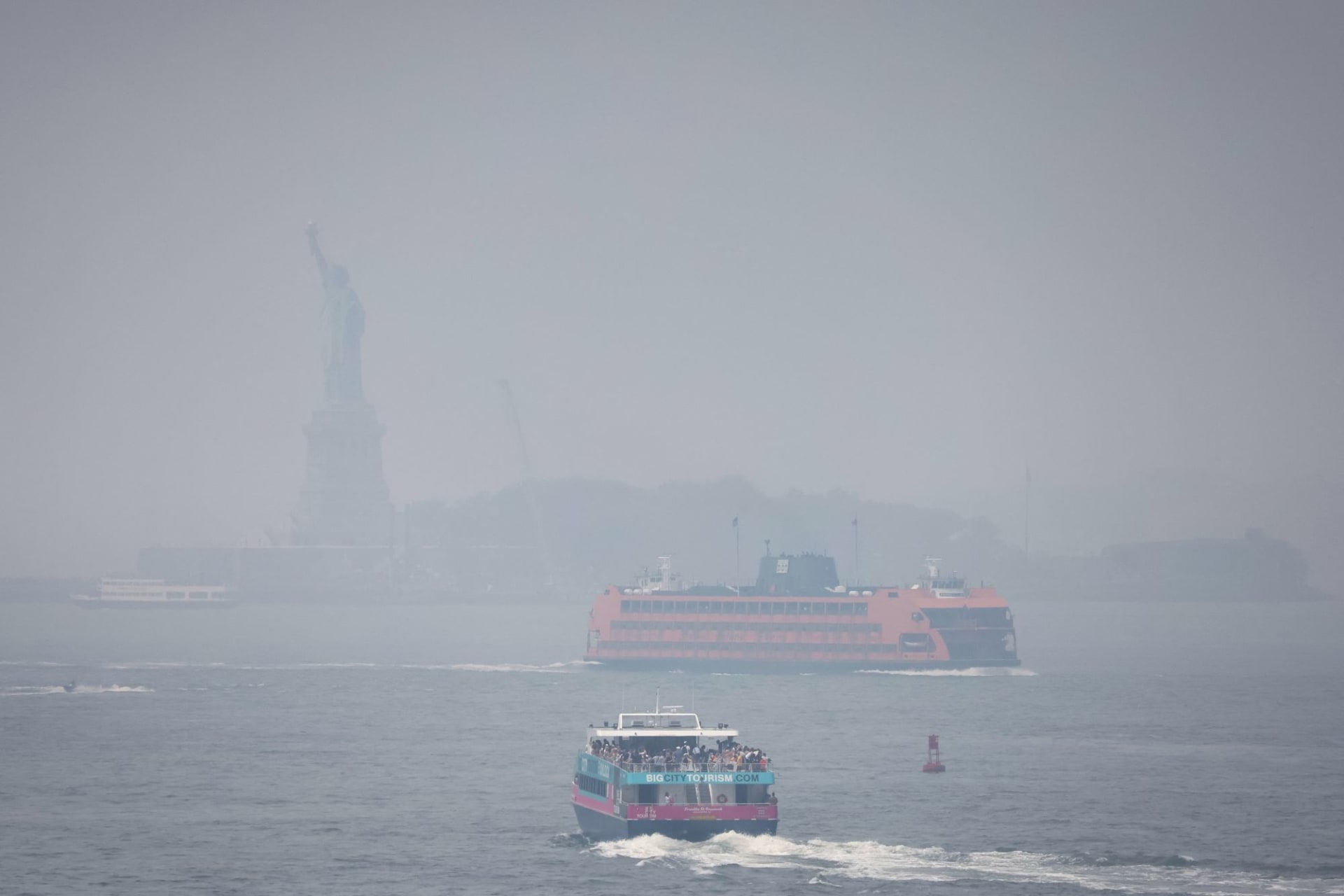 <p>The Statue of Liberty hidden behind smoke from Canadian wildfires on June 30, 2023.</p>
