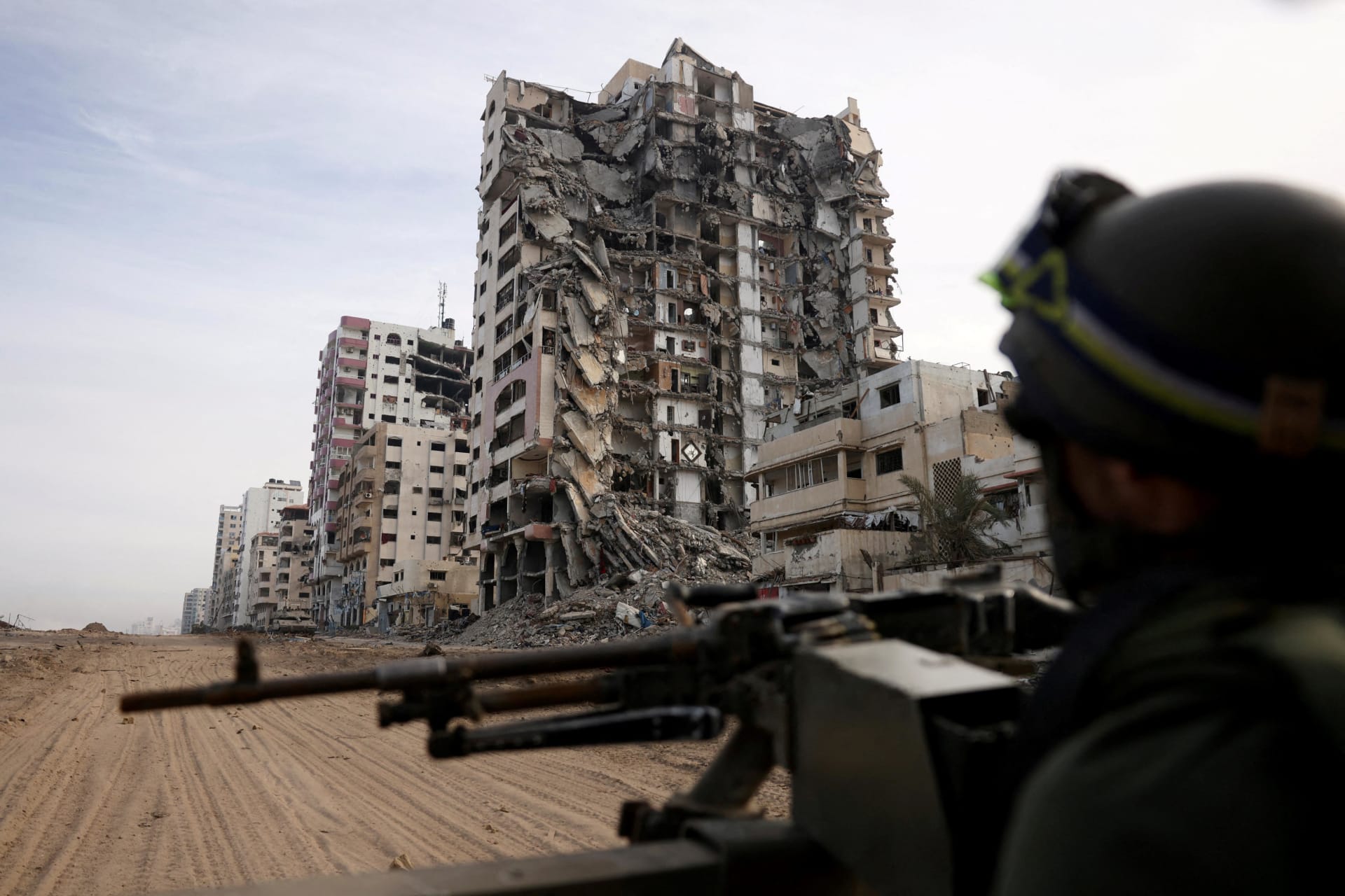 <p>An Israeli soldier sits in a Humvee amid the ongoing ground operation in northern Gaza on November 22, 2023.</p>
