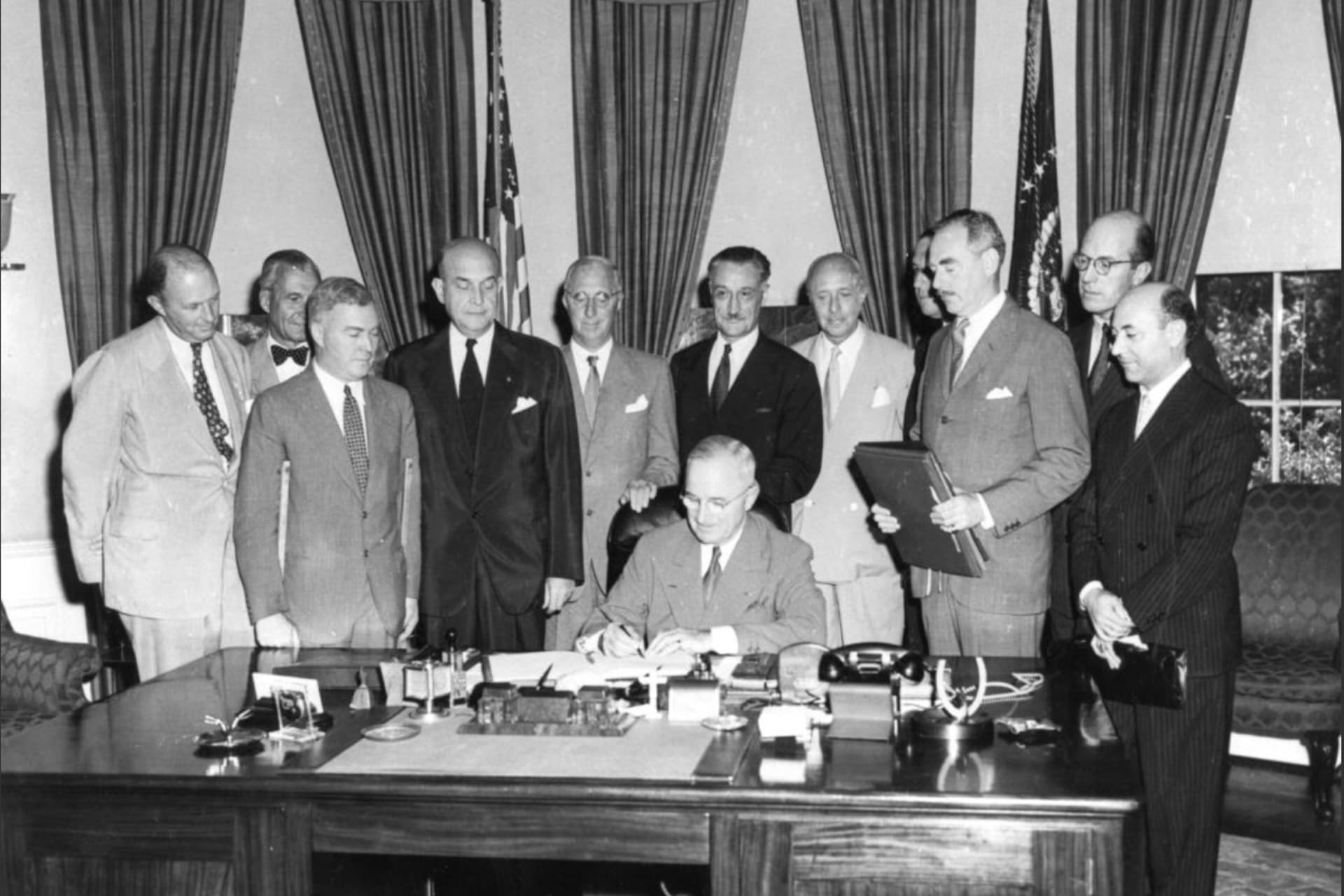 <p>President Harry Truman signs the North Atlantic Treaty in Washington, DC, on August 29, 1949.</p>
