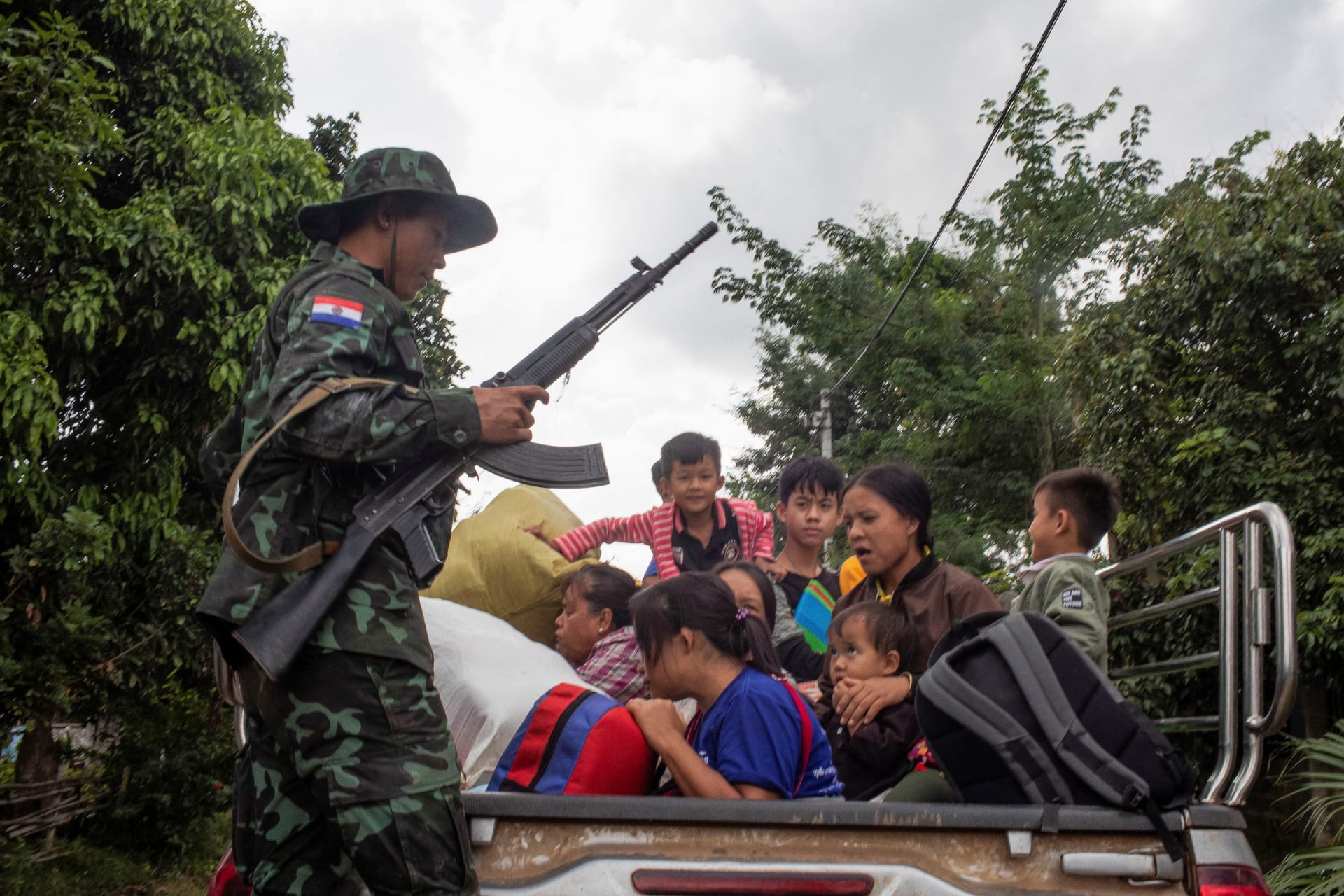<p>A member of the insurgent KNDF Karenni Nationalities Defence Force rescues civilians trapped amid airstrikes during a battle to take over Loikaw in Kayah State, Myanmar, on November 14, 2023. </p>
