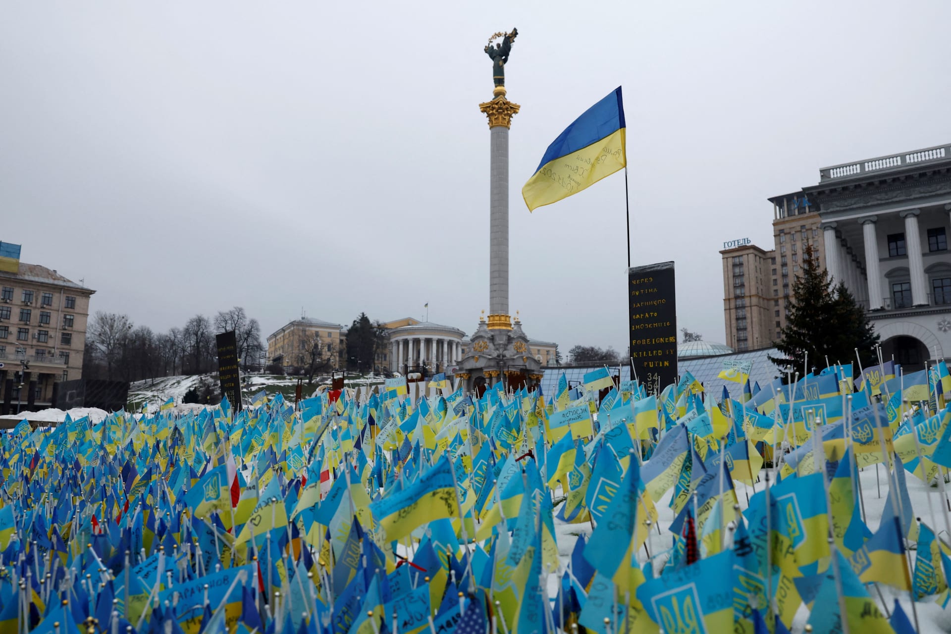 <p>Flags representing fallen soldiers are seen in the snow on Independence Square, as Russia’s attack on Ukraine continues, in Kyiv, Ukraine on December 22, 2022.</p>
