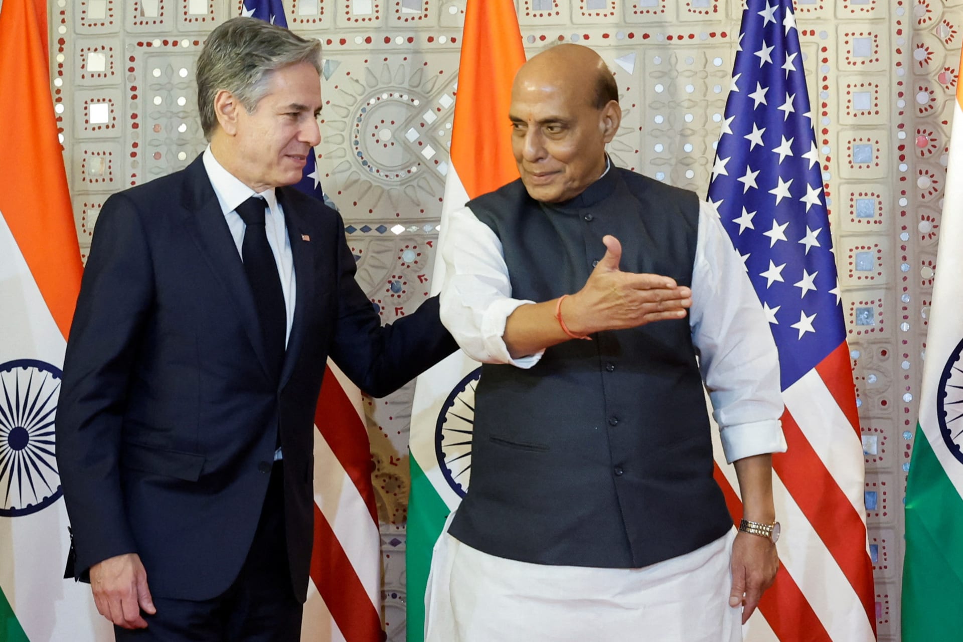 <p>Indian Defense Minister Rajnath Singh gestures to U.S. Secretary of State Antony Blinken as they leave the 2+2 Dialogue in New Delhi.</p>
