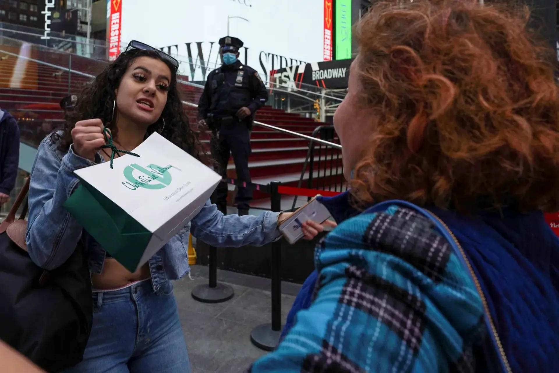 <p>Pro-Palestine supporter confronts a Pro-Israel protester during a rally at Times Square in New York City</p>
