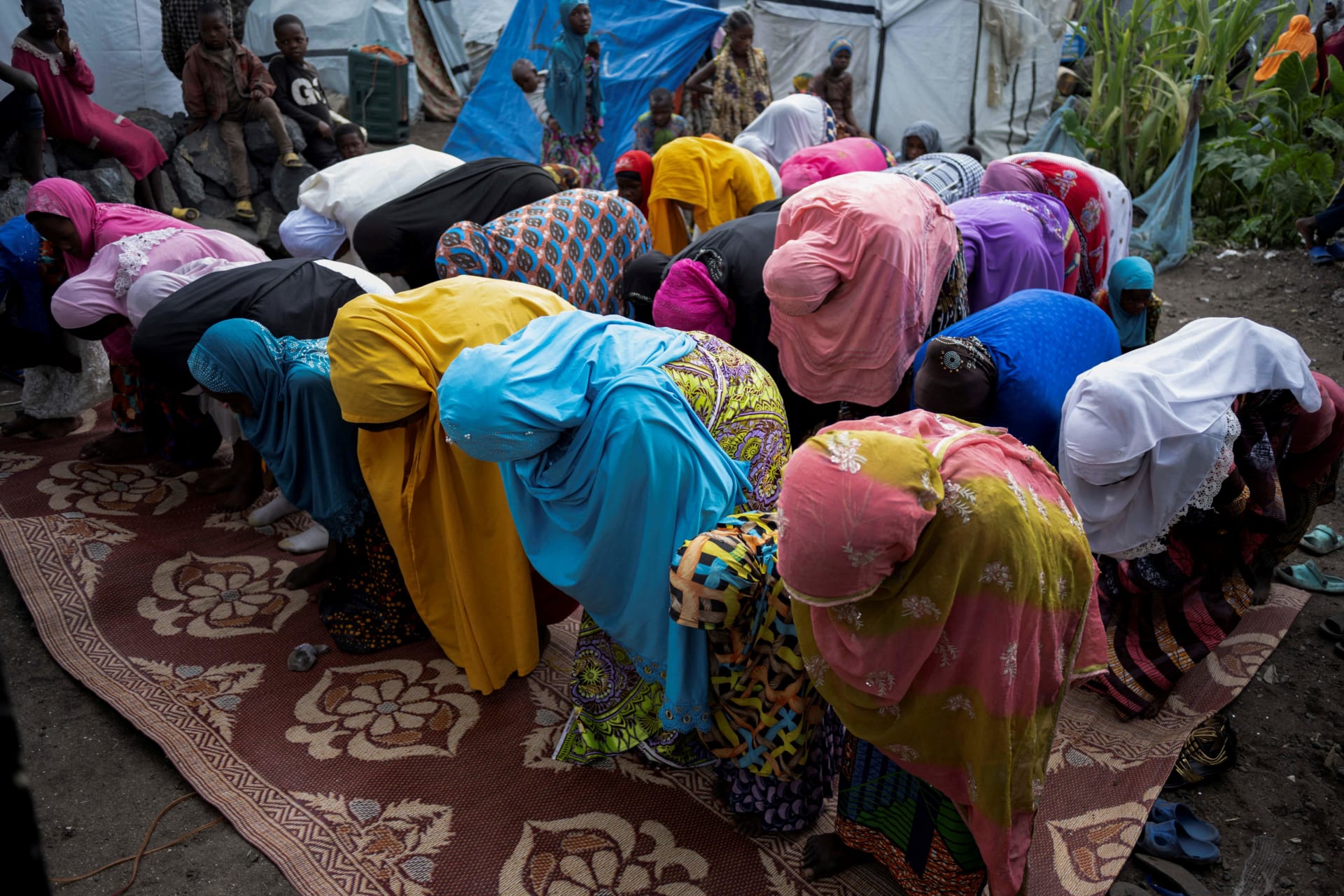 <p>Internally displaced Congolese Muslim women attend Eid al-Fitr prayers in the Munigi camp site near Goma in the North Kivu province of the Democratic Republic of Congo, April 21, 2023.</p>
