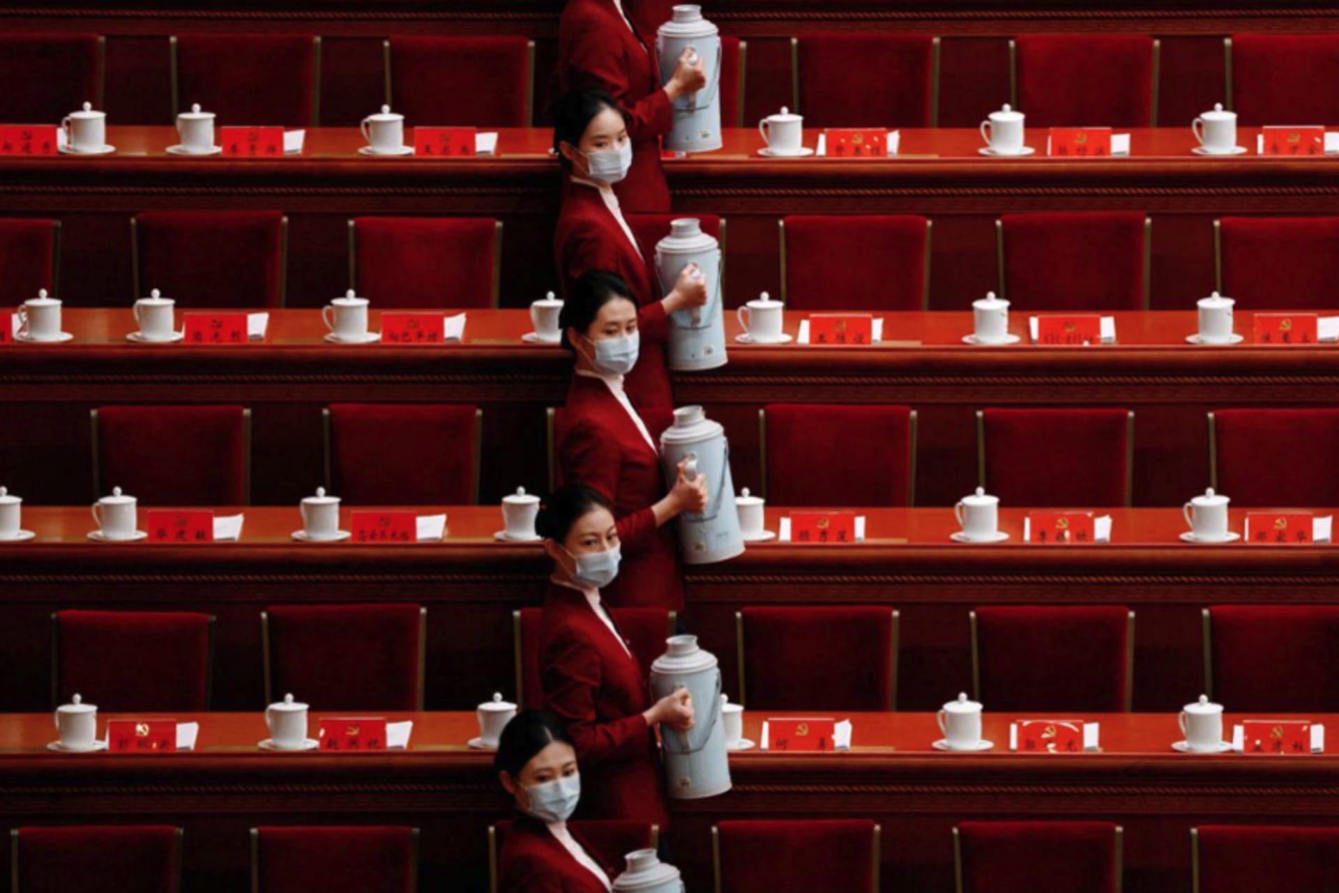 <p>Attendants carry tea before the opening ceremony of the Twentieth National Congress of the Chinese Communist Party held in the Great Hall of the People in Beijing, China.</p>
