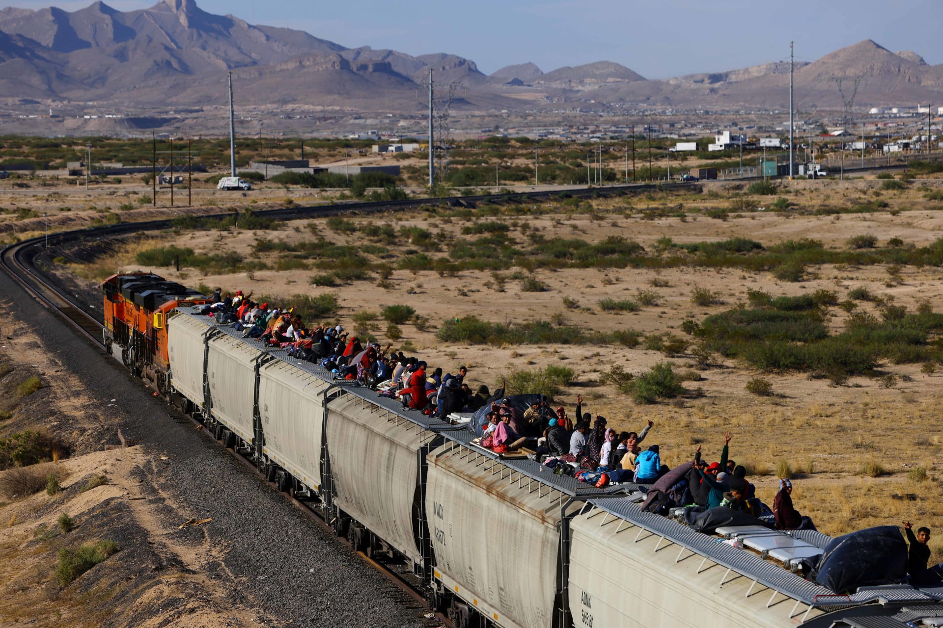 <p>Migrants, mostly from Venezuela, travel on a train with the intention of reaching the United States, in Ciudad Juarez, Mexico, October 6, 2023.</p>
