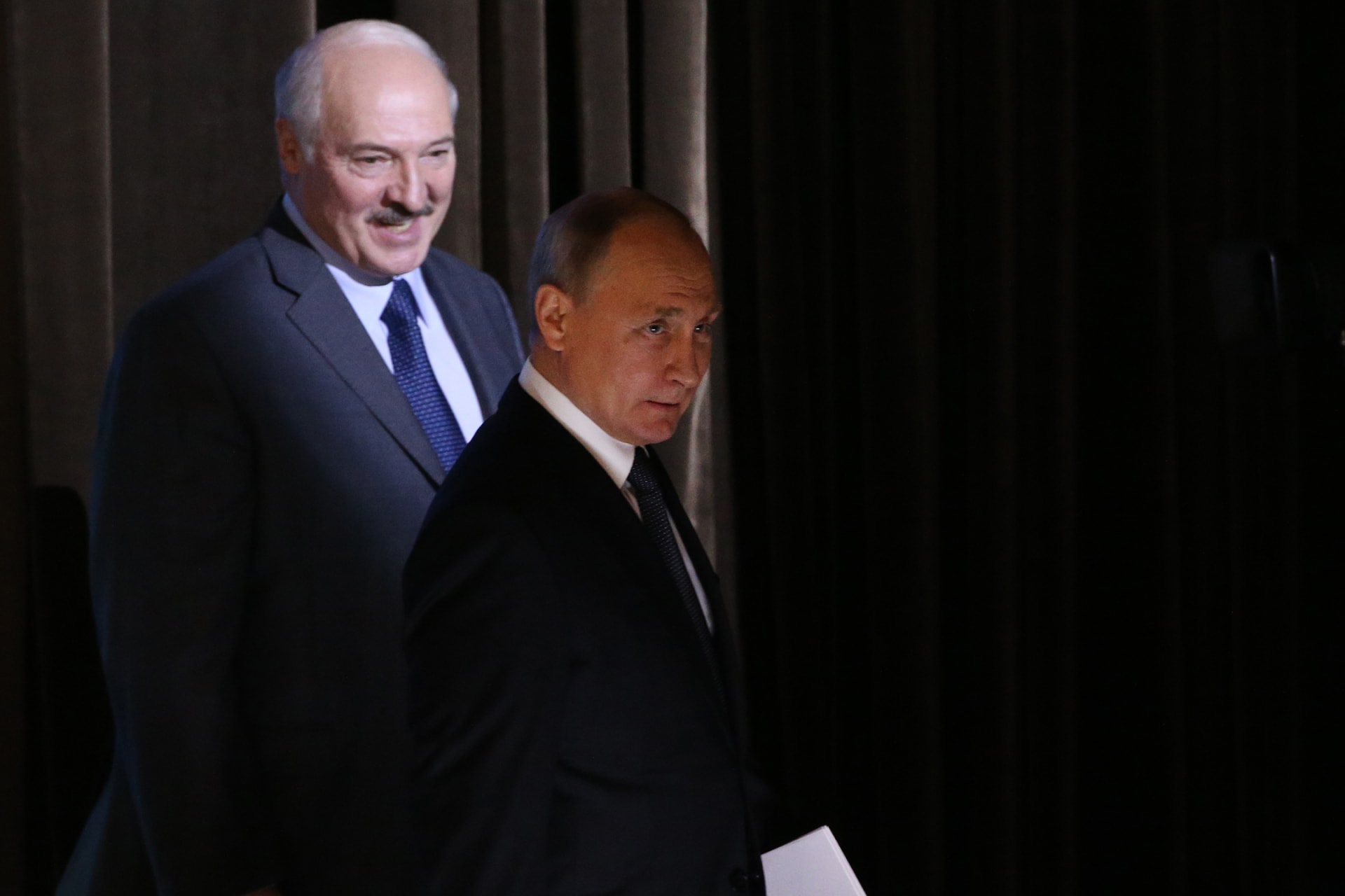 <p>Presidents Alexandr Lukashenko and Vladimir Putin attend a regional forum in 2018.</p>
