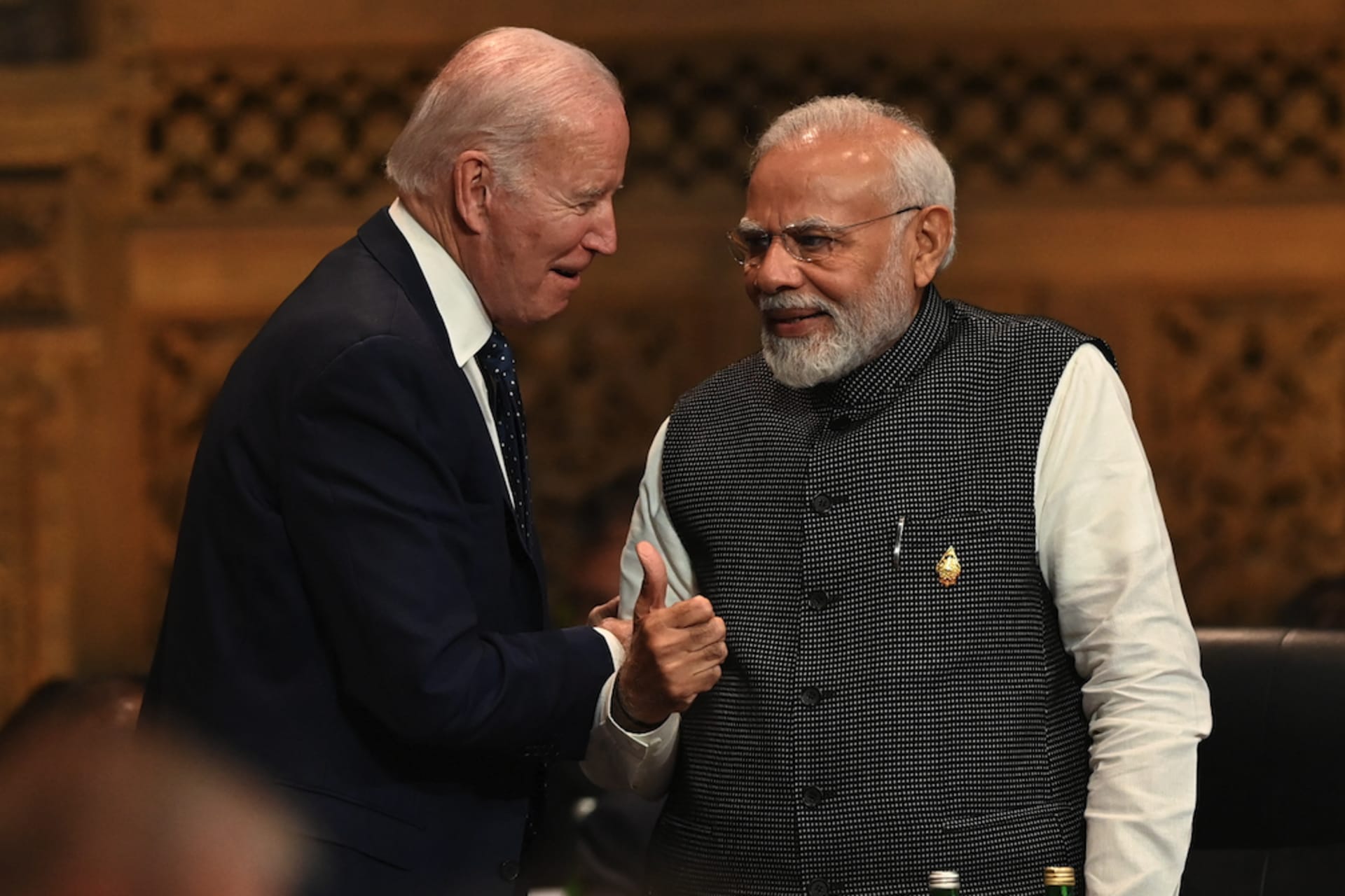 <p>U.S. President Joe Biden speaks with Prime Minister of India Narendra Modi at the opening session of 2022’s G20 Summit held in Bali, Indonesia.</p>
