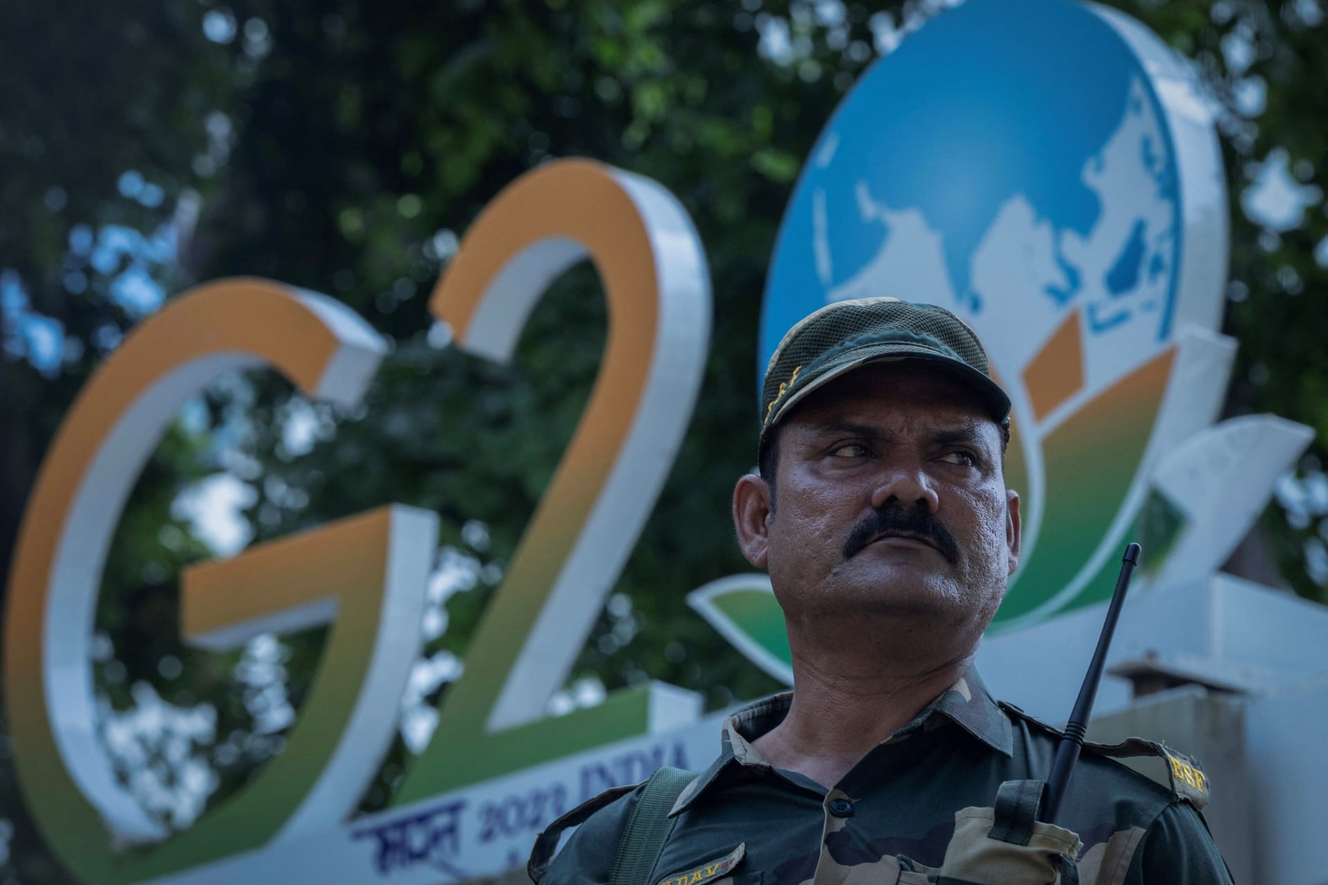 <p>A paramilitary soldier stands guard outside a hotel during a rehearsal ahead of the G20 Summit in New Delhi, India.</p>
