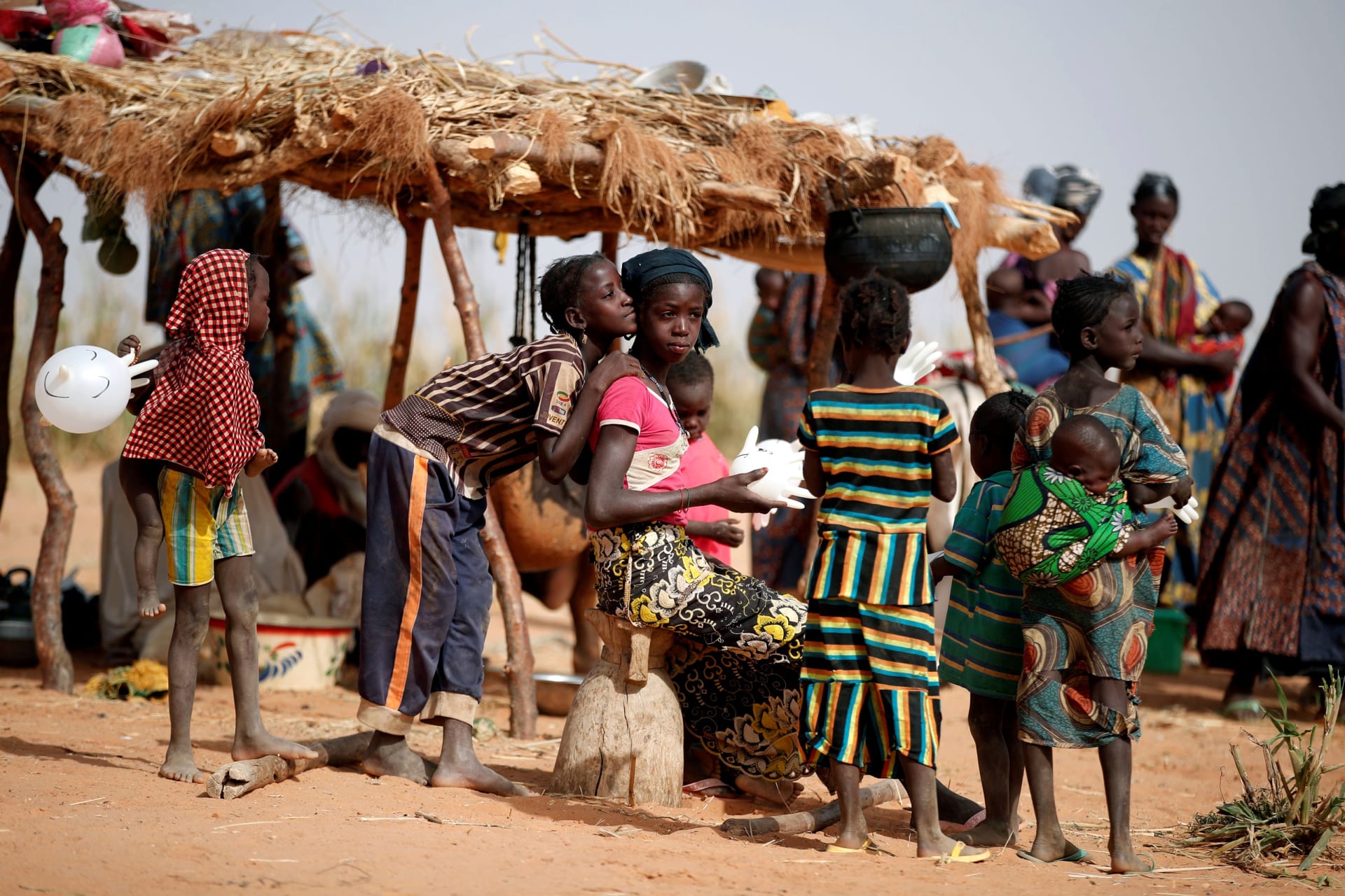 <p>Women and children are pictured during an assistance operation to nomade families during the regional anti-insurgent Operation Barkhane in Tin Hama.</p>
