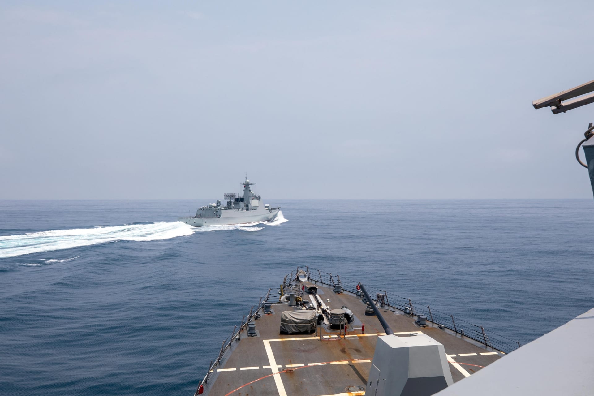 <p>Chinese warship Luyang III sails past U.S. destroyer USS Chung-Hoon in the Taiwan Strait on June 3, 2023.</p>