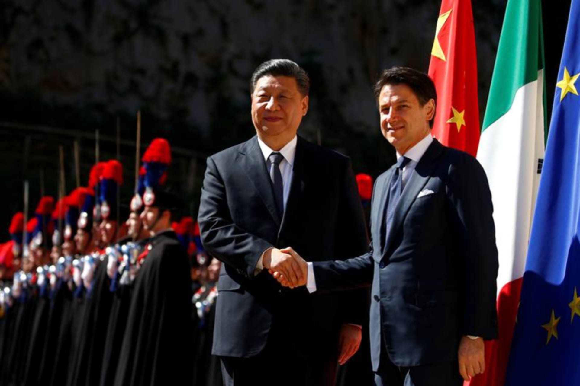 <p>Former Italian Prime Minister Giuseppe Conte greets Chinese President Xi Jinping before a meeting in Rome, Italy in March, 2019.</p>
